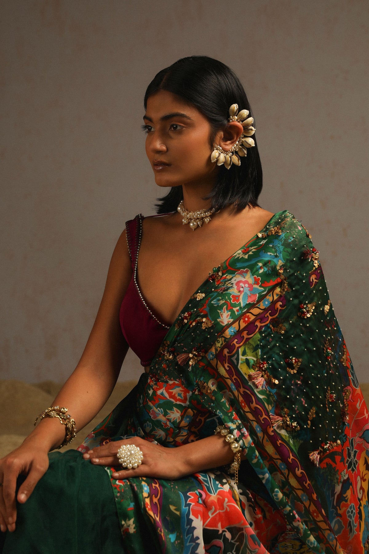 Green Draped Saree With Purple Blouse