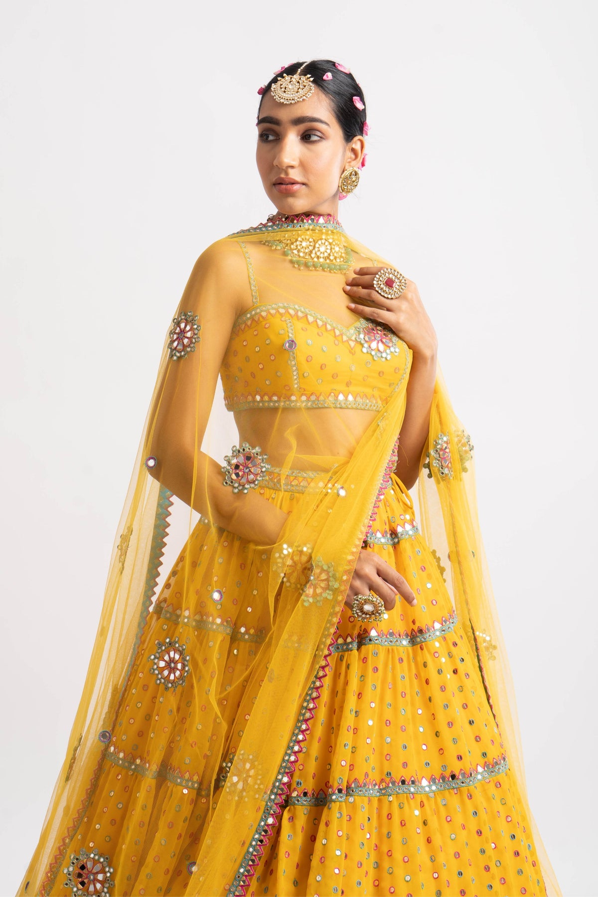 Yellow multi tier lehenga set