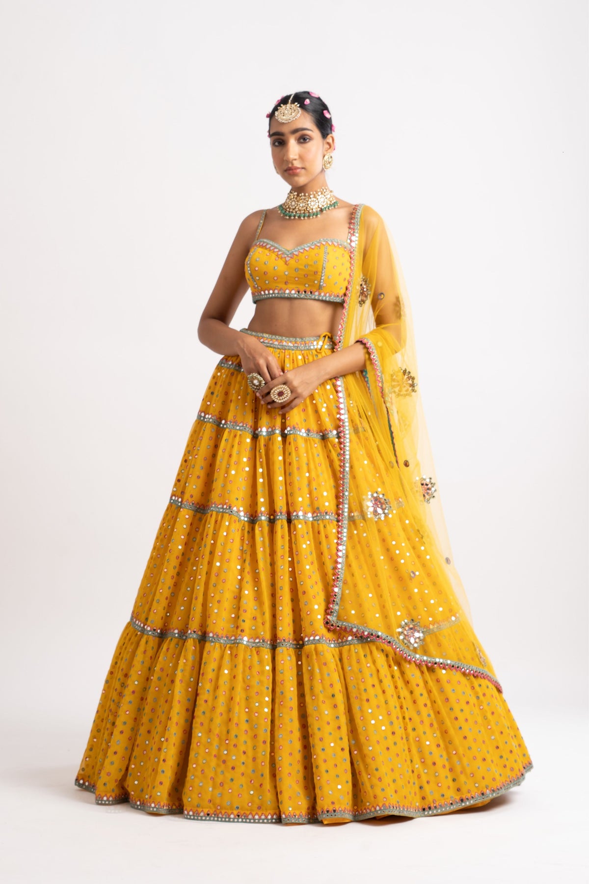 Yellow multi tier lehenga set