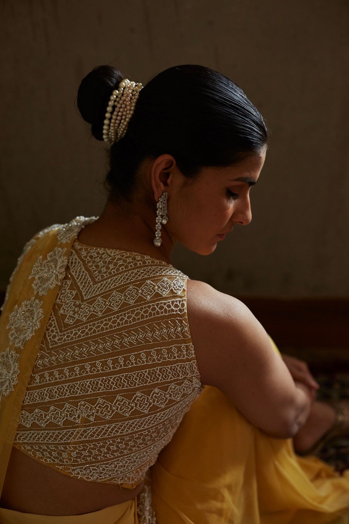 Yellow pleated saree and blouse