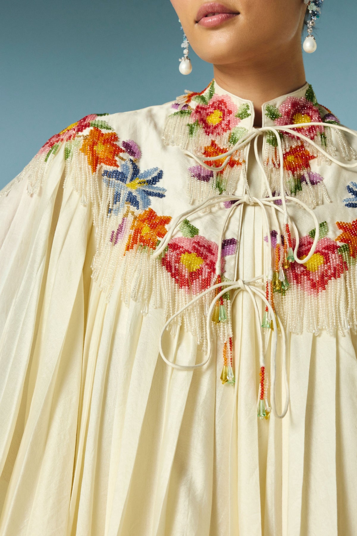 Pleated Dress With Floral Cape