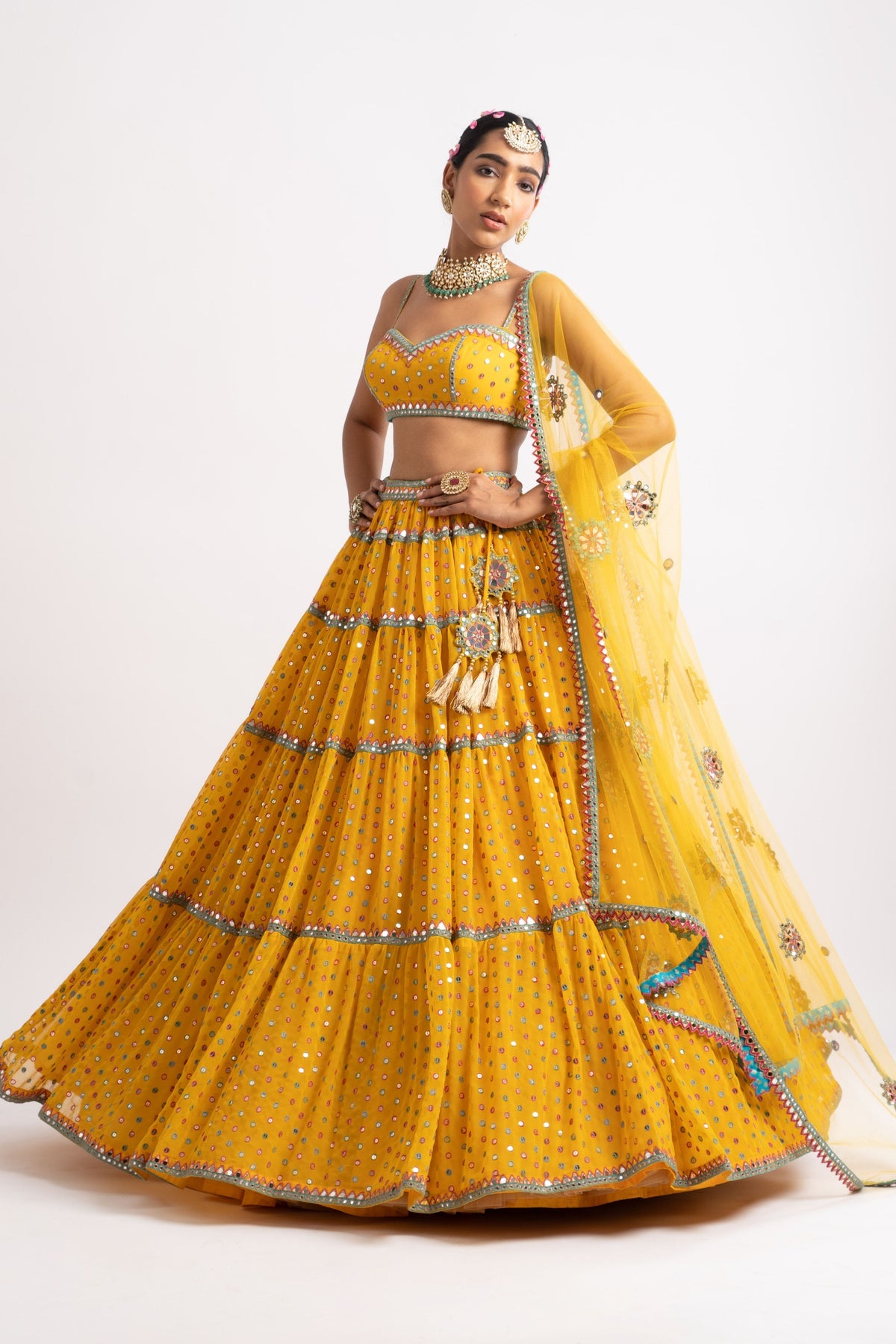 Yellow multi tier lehenga set