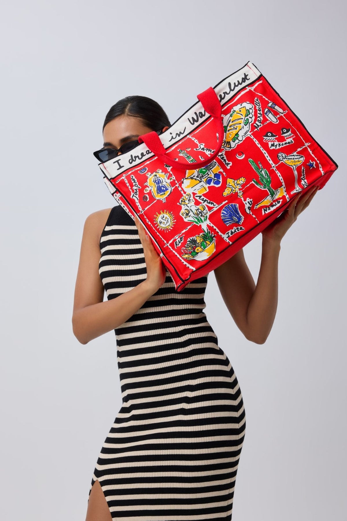 The Wanderlust in Red Bag