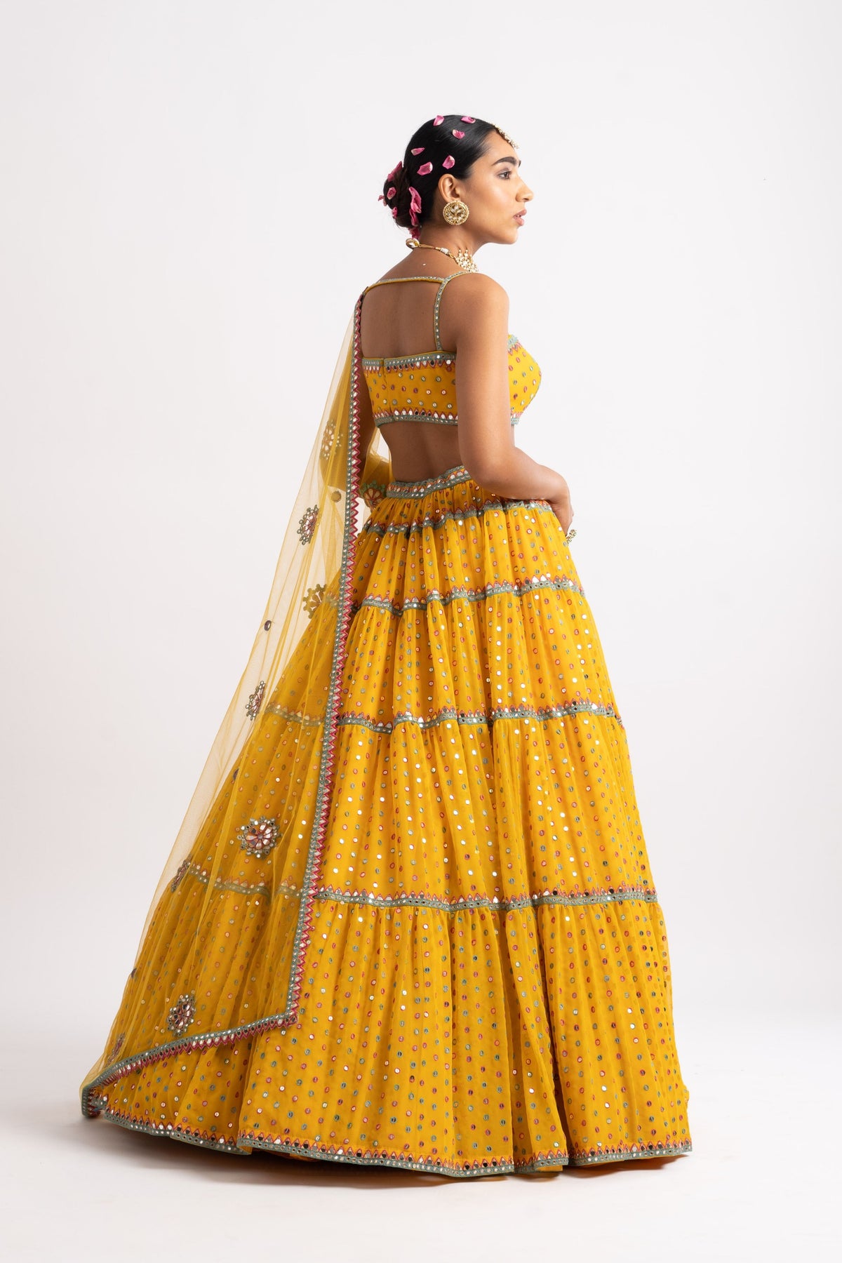 Yellow multi tier lehenga set