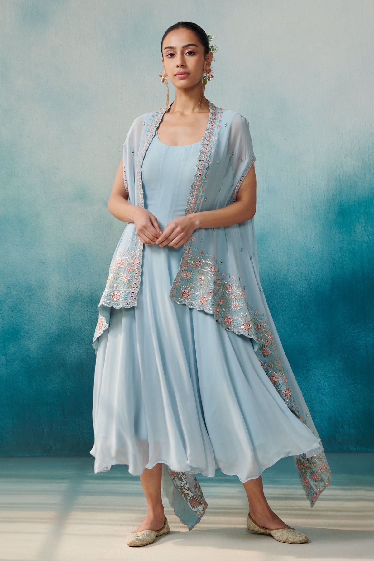 Blue Dress With a Cape
