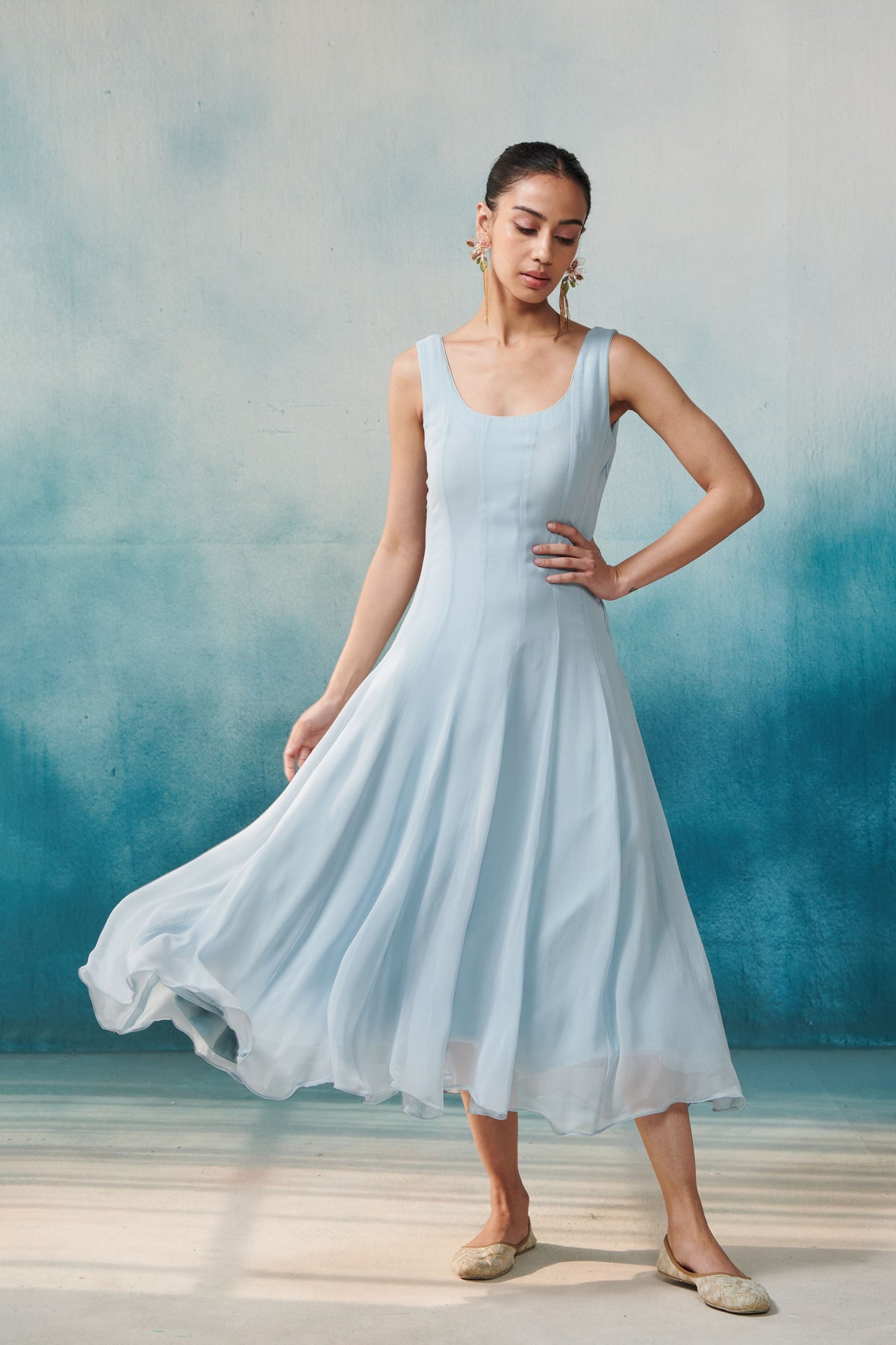 Blue Dress With a Cape
