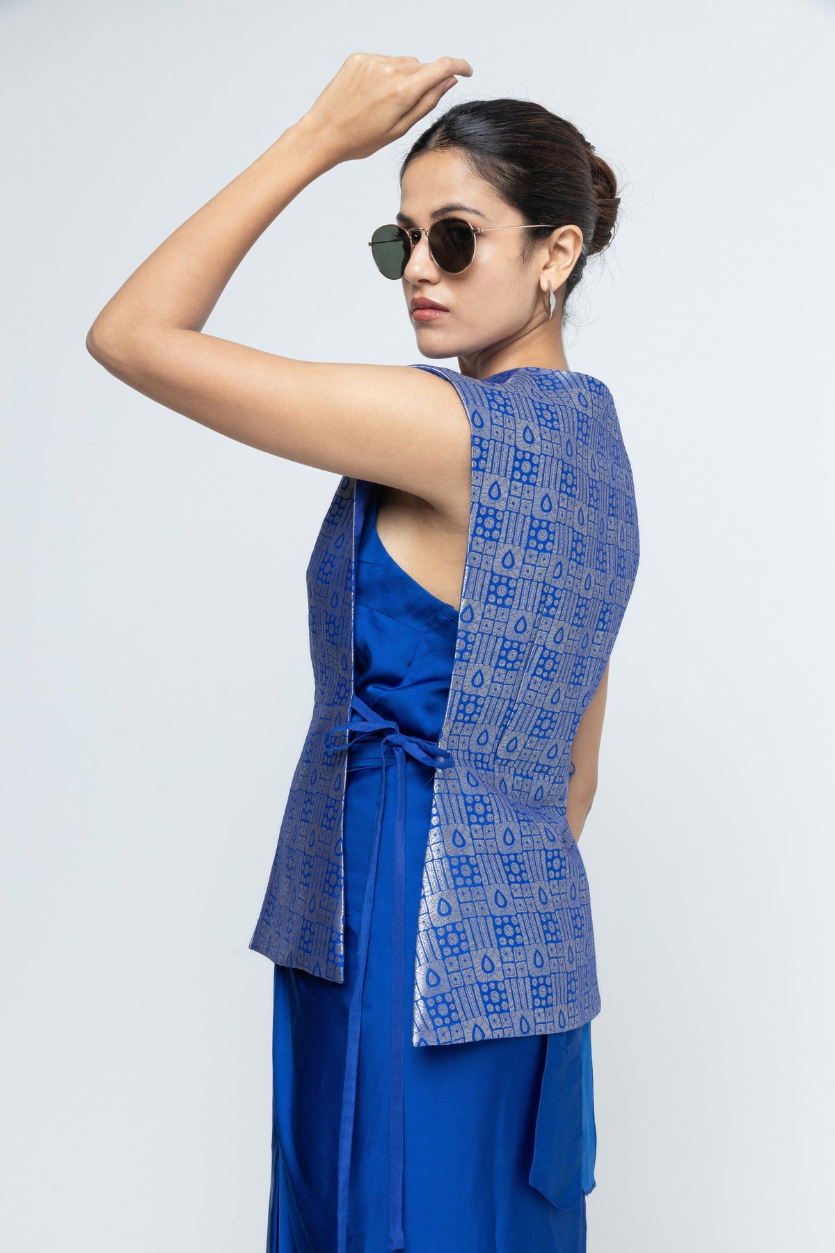 Alia Gilet Paired With Asymmetrical Dress