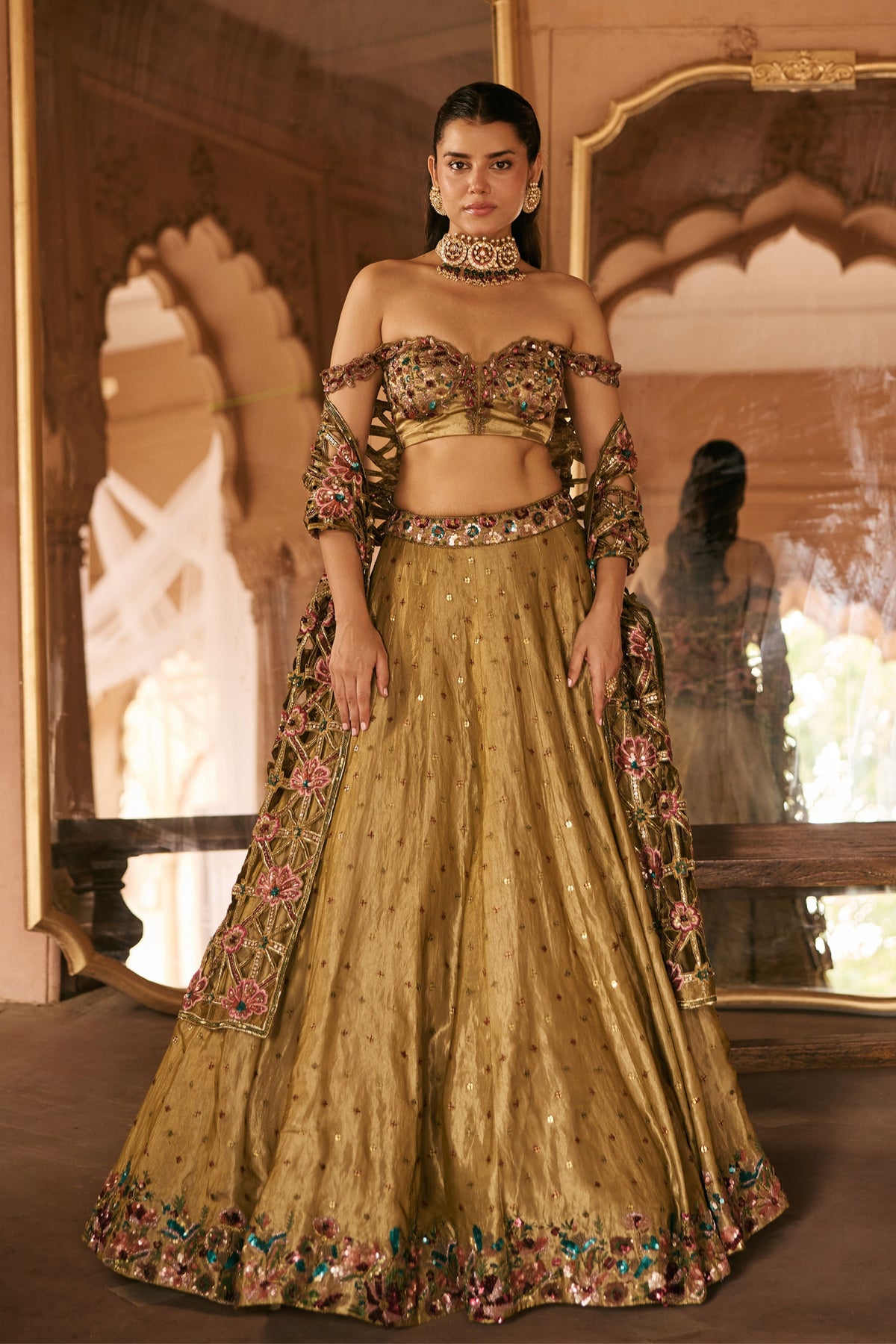 Ensemble Combines Gold Lehenga Set