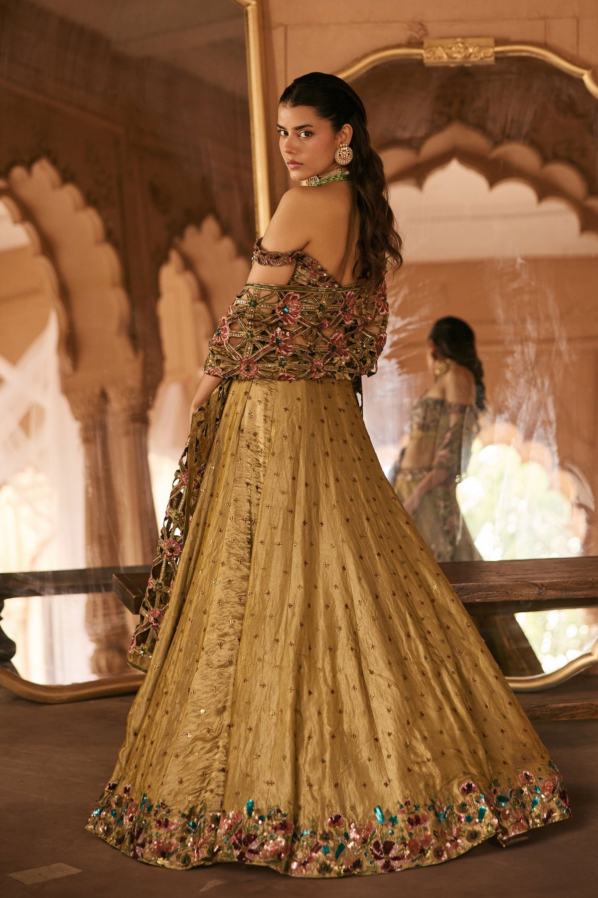 Ensemble Combines Gold Lehenga Set