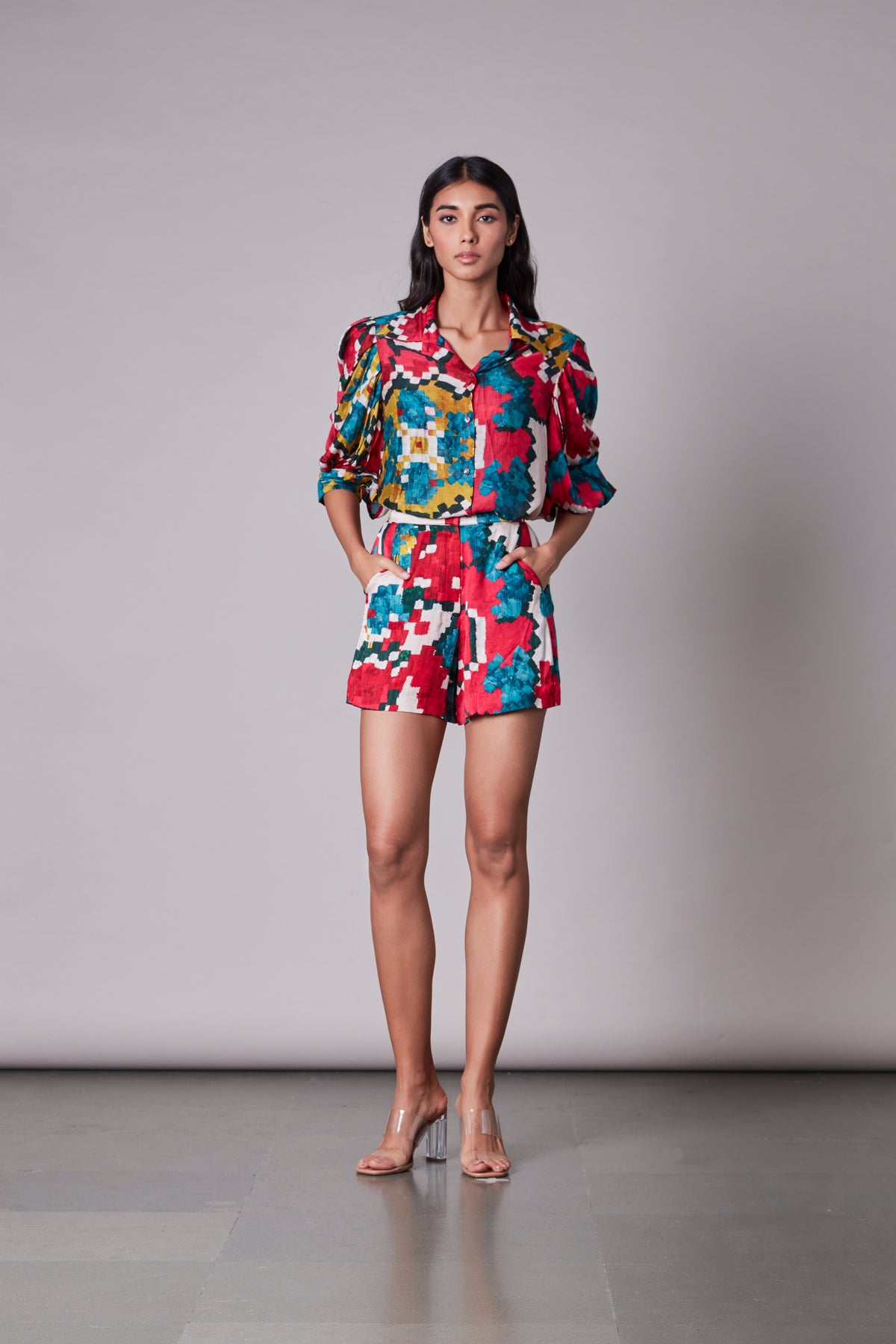 Ikat print shirt paired with shorts.