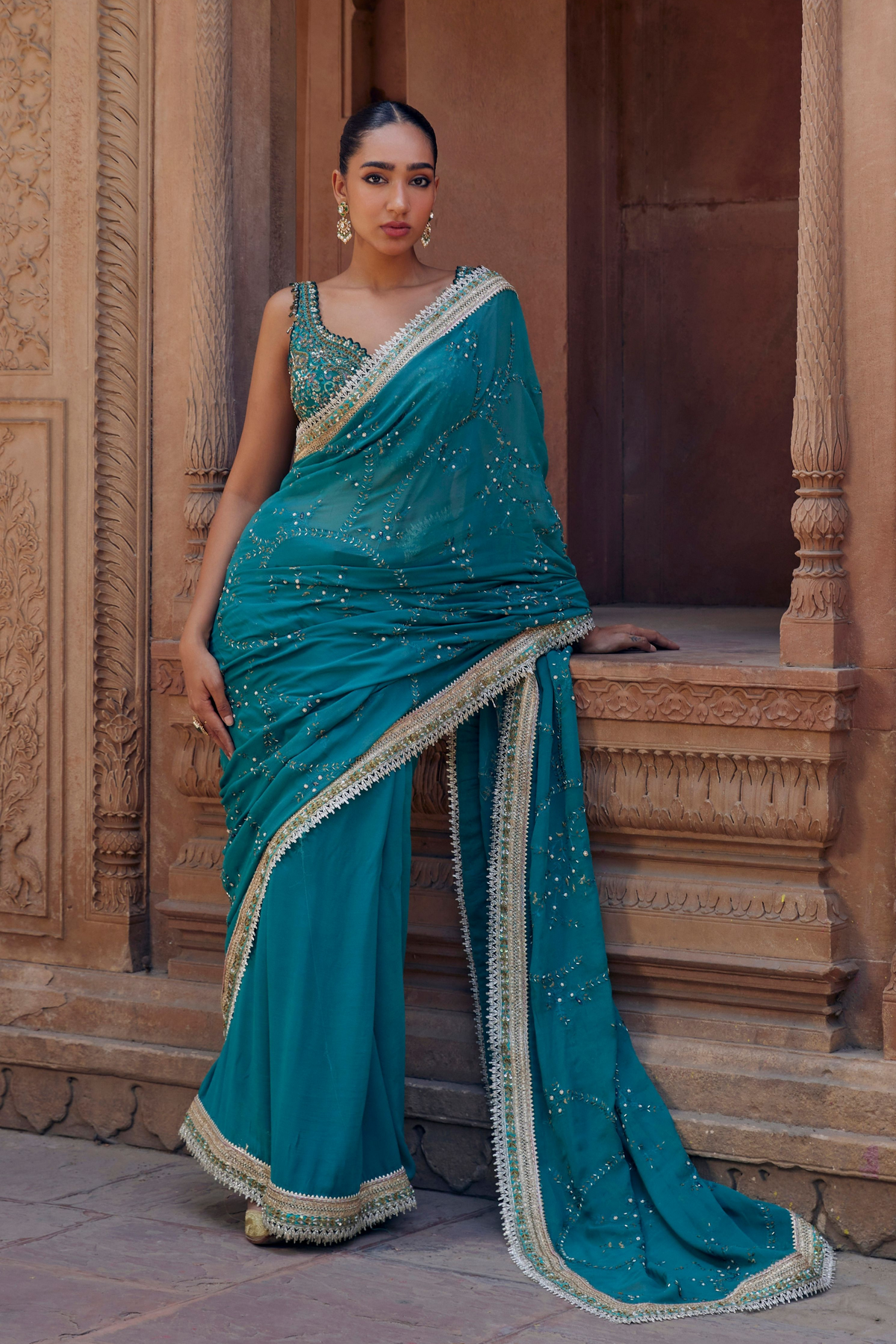 Nandni Turquoise Saree With Handcrafted Jaal