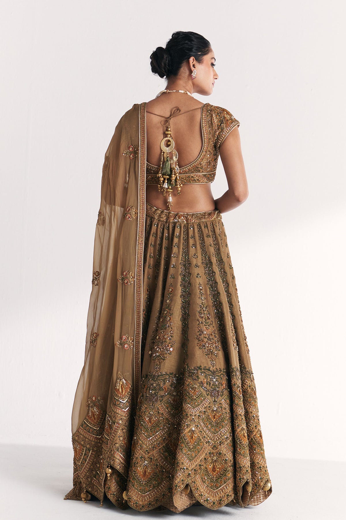Kasturi Gold Lehenga Set