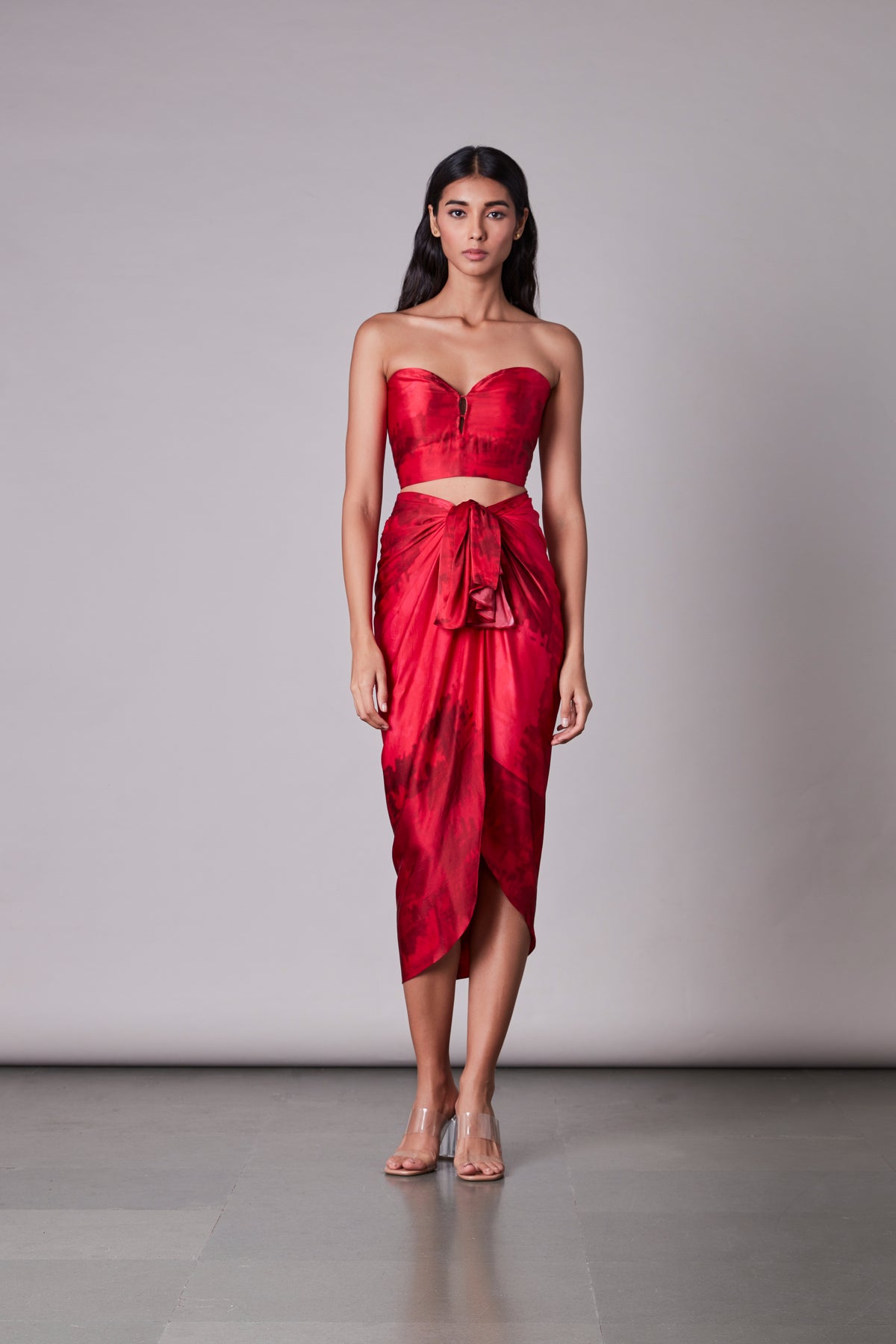 Bustier paired with asymmetric wrap skirt