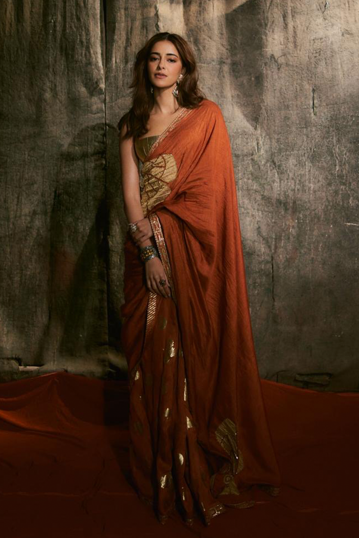 Ananya Panday in Rust Windrose Crushed Saree