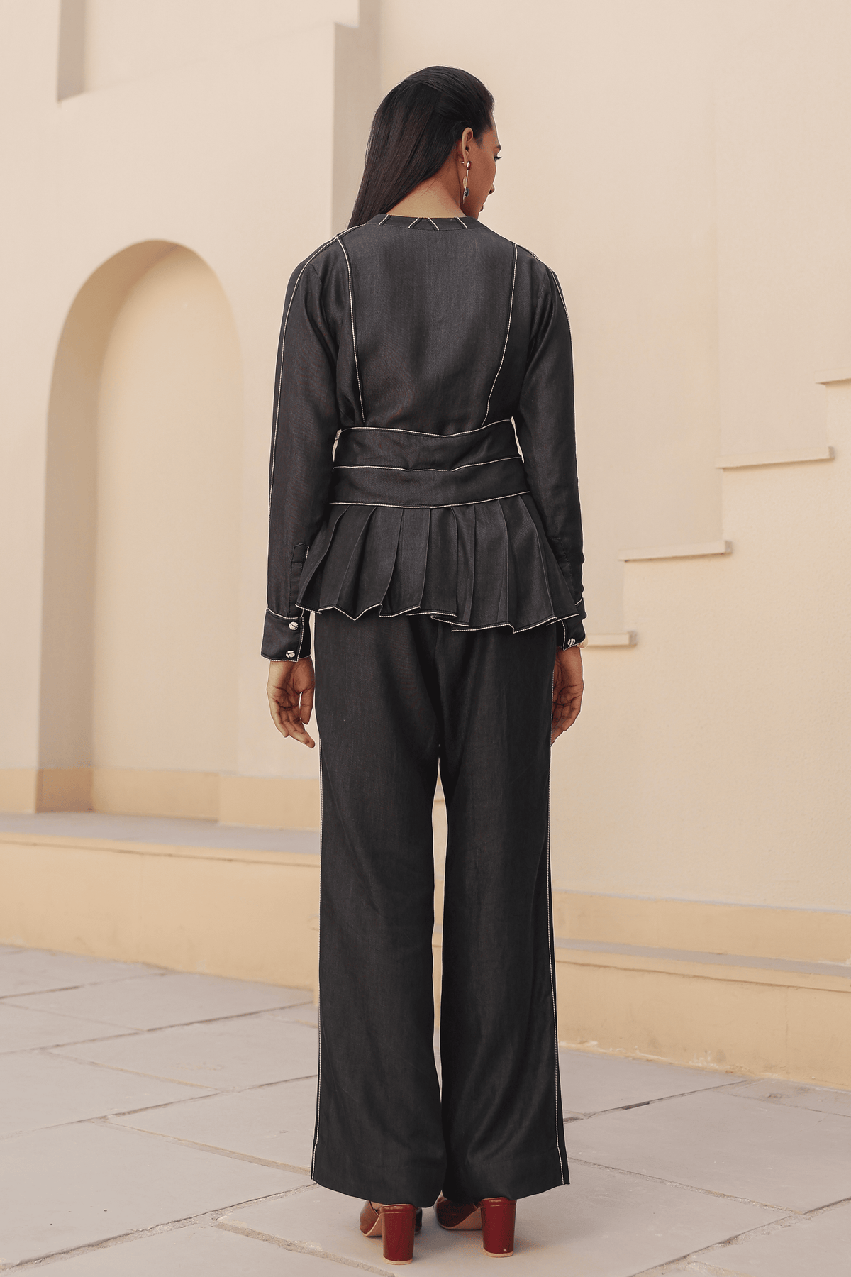 Azure Pleated Peplum Top in Black