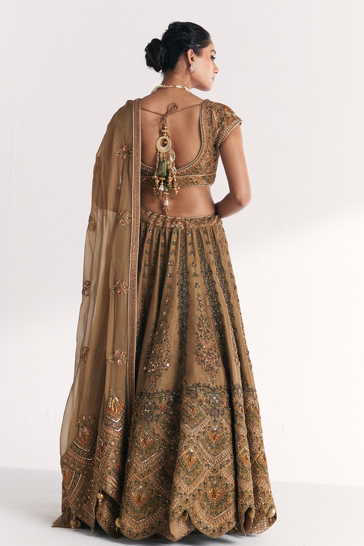 Kasturi Gold Lehenga Set