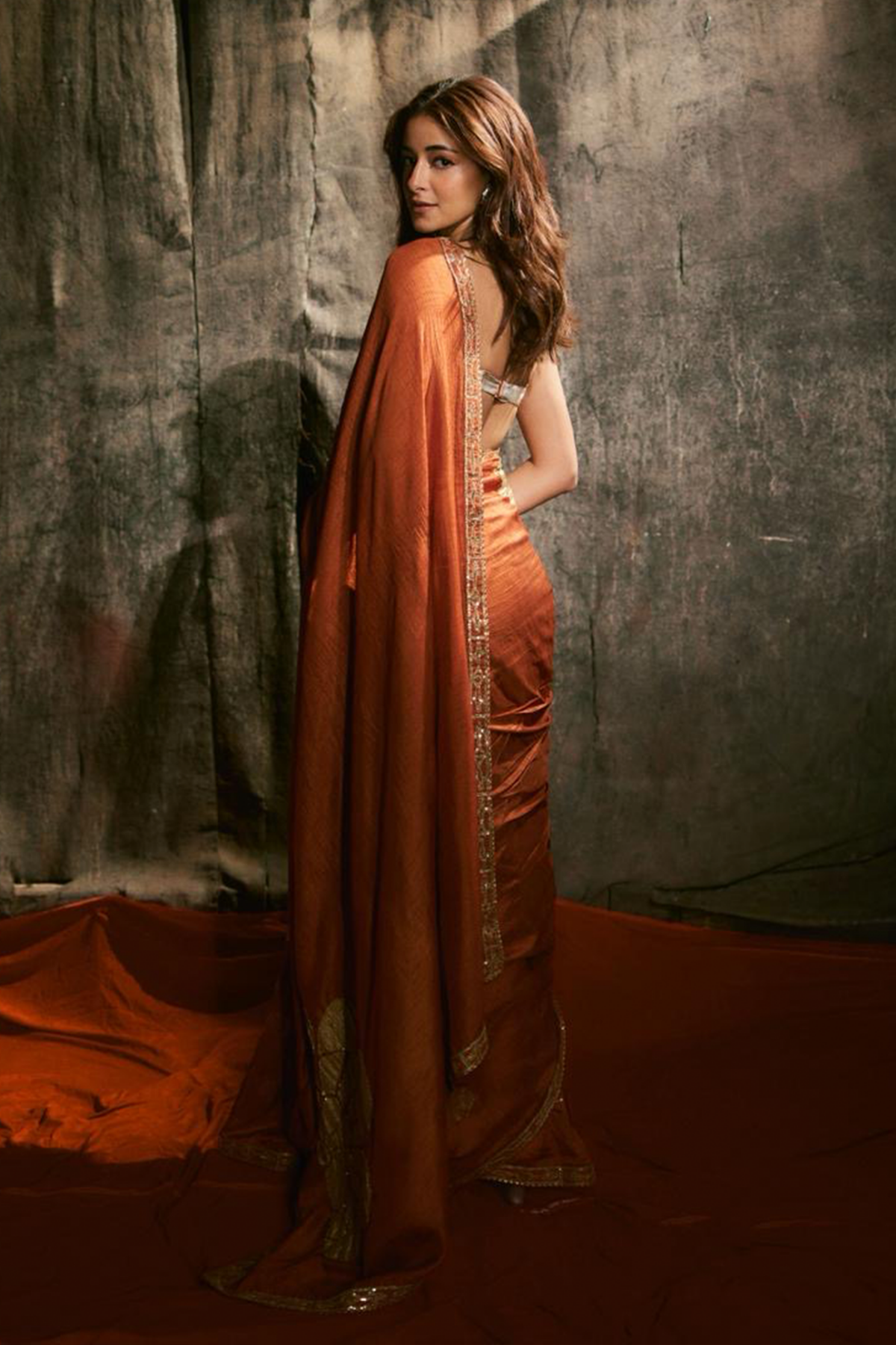 Ananya Panday in Rust Windrose Crushed Saree