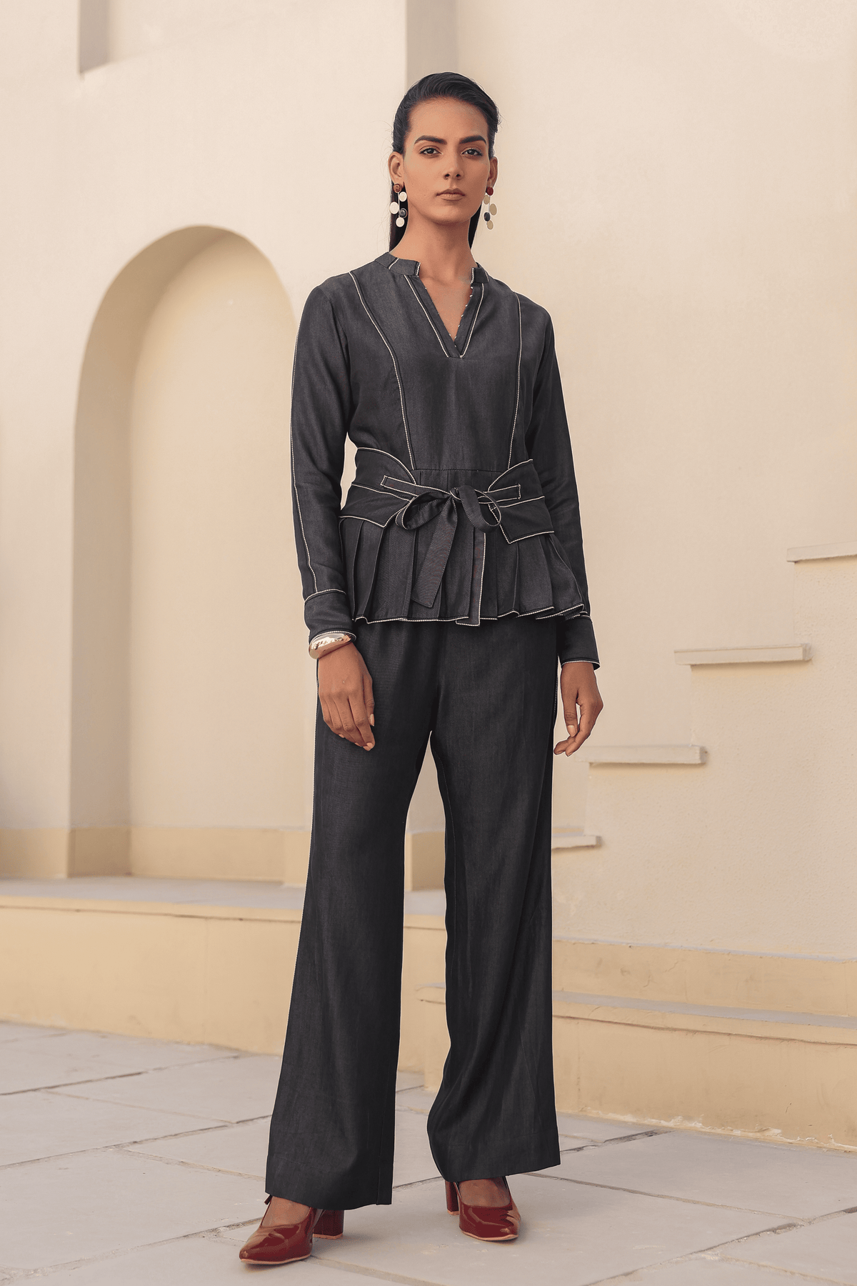 Azure Pleated Peplum Top in Black