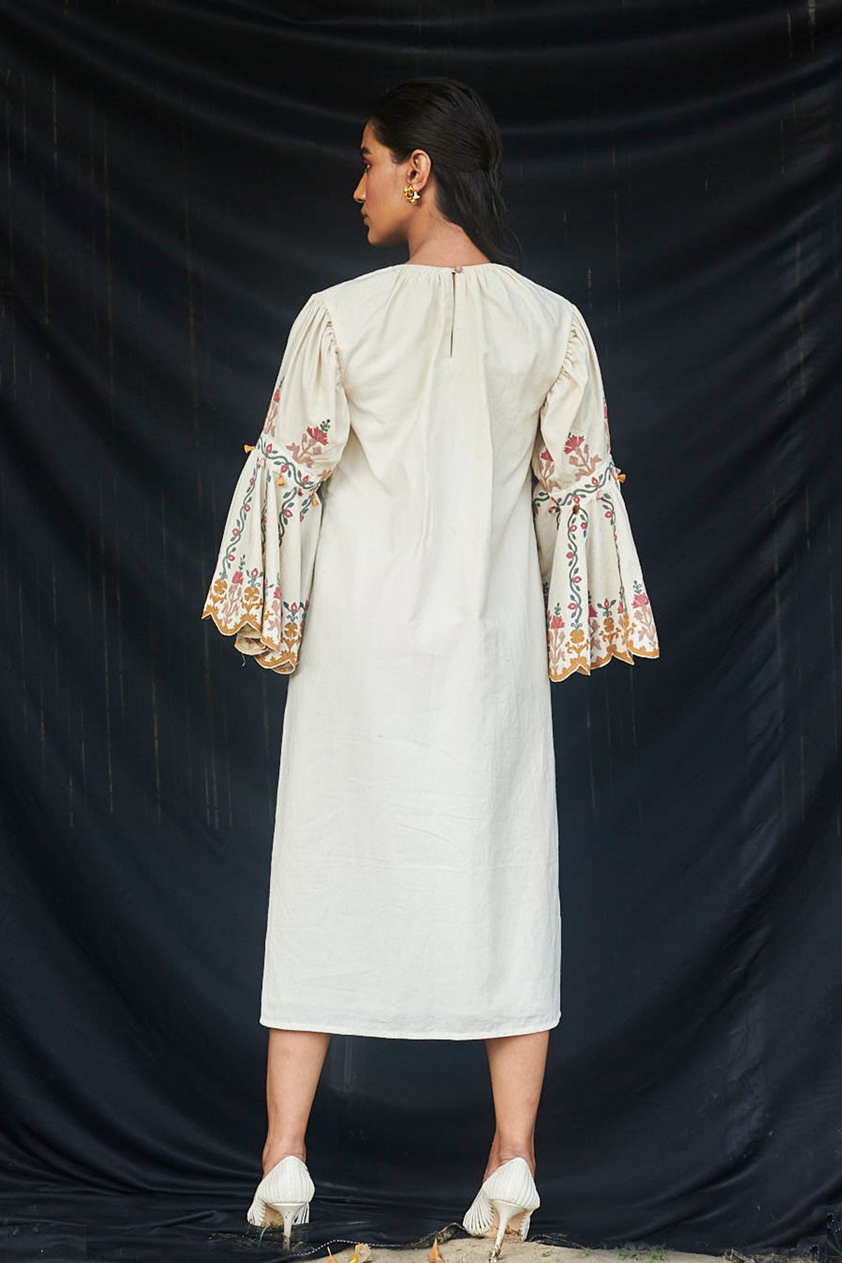 Ivory dress with bell sleeves