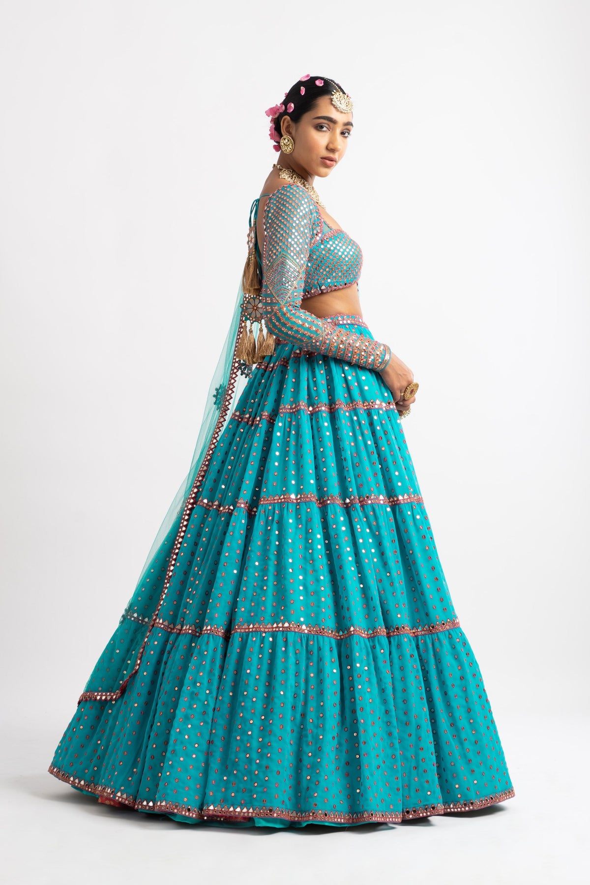 Peacock green multi tier lehenga