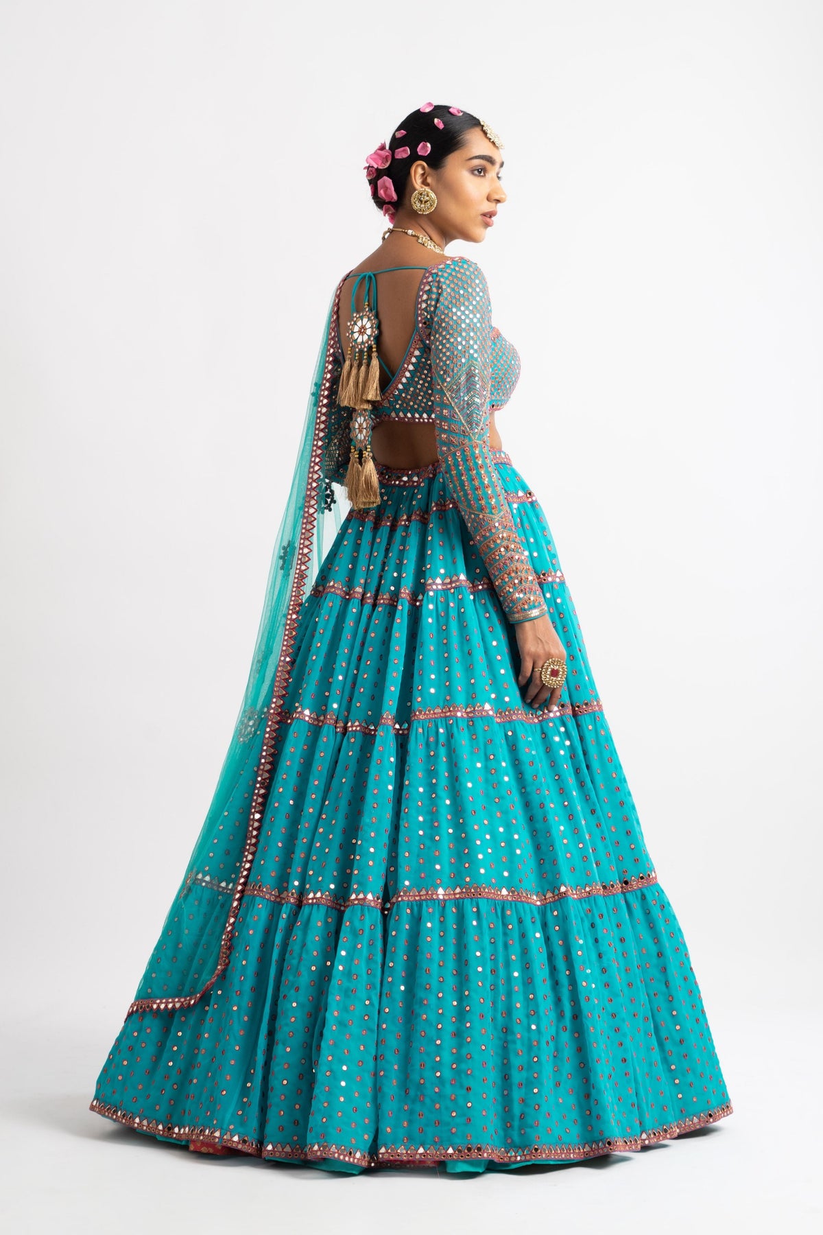 Peacock green multi tier lehenga