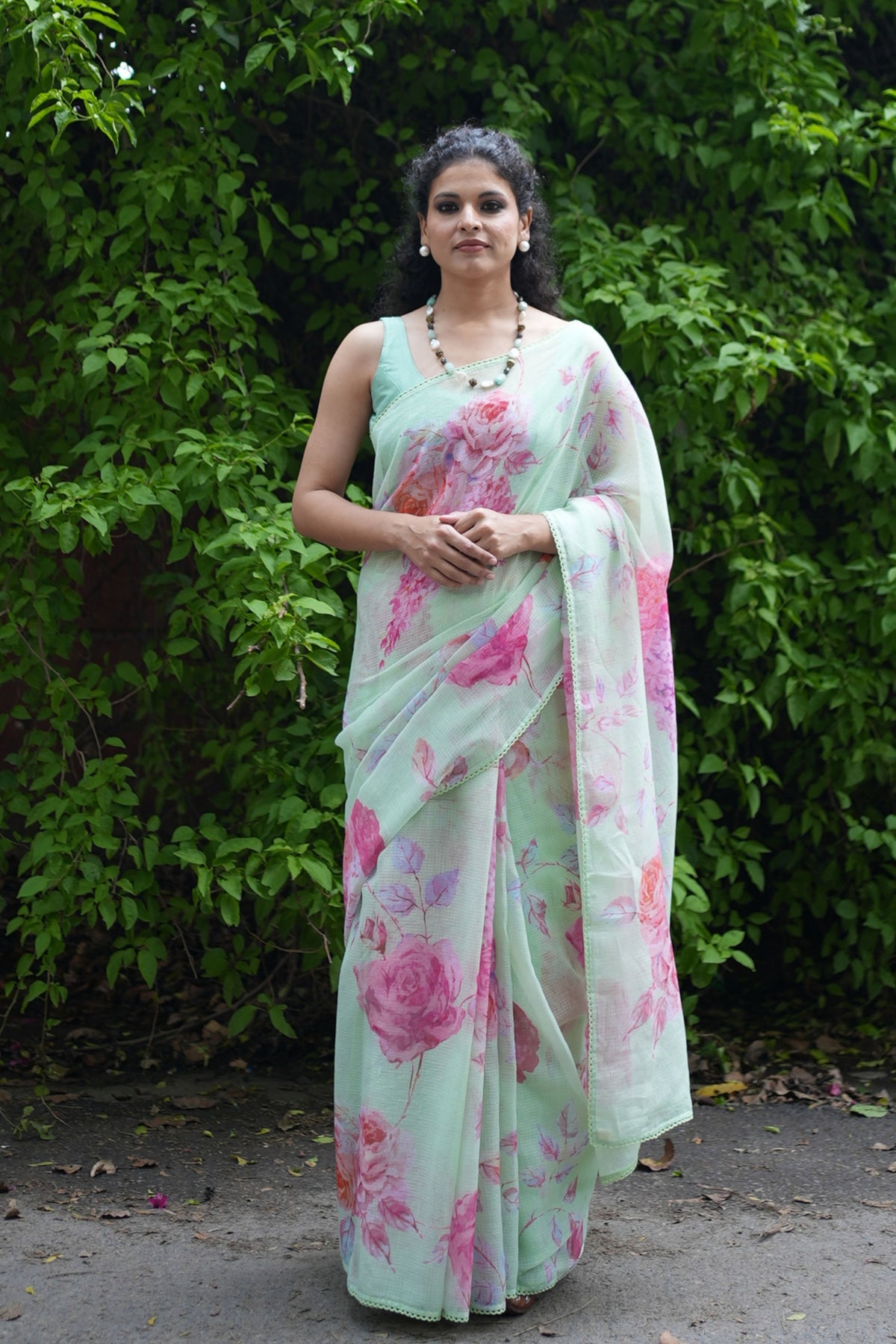 Komal Radiant Floral Green Saree