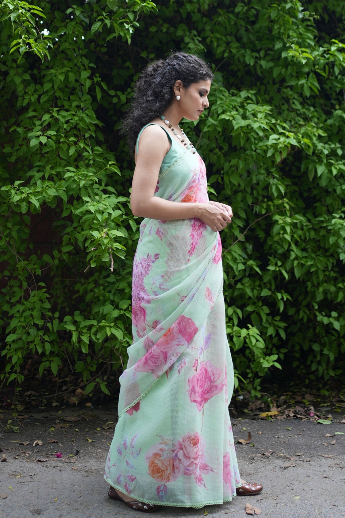 Komal Radiant Floral Green Saree