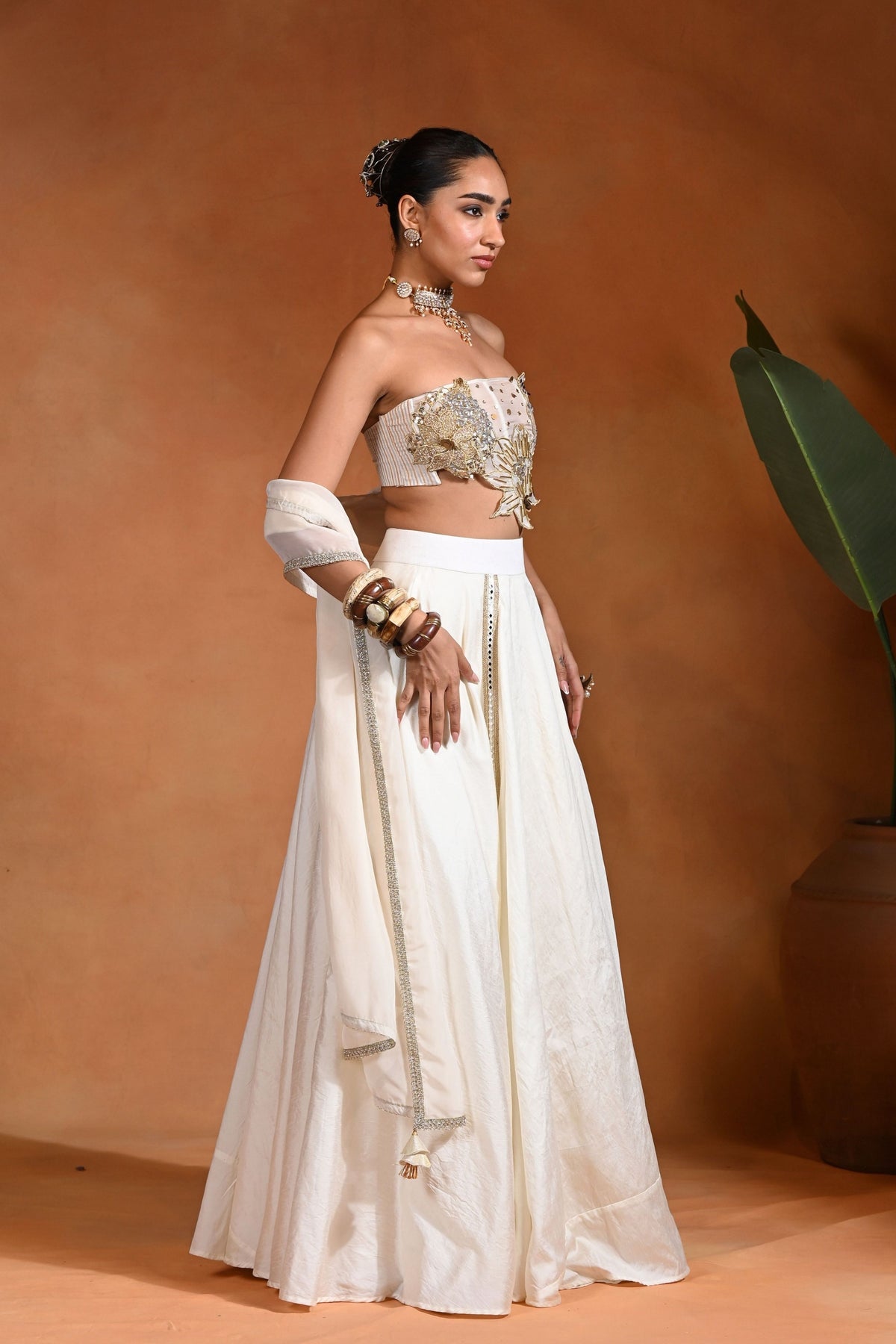 Dilbar Ivory Gold Lehenga