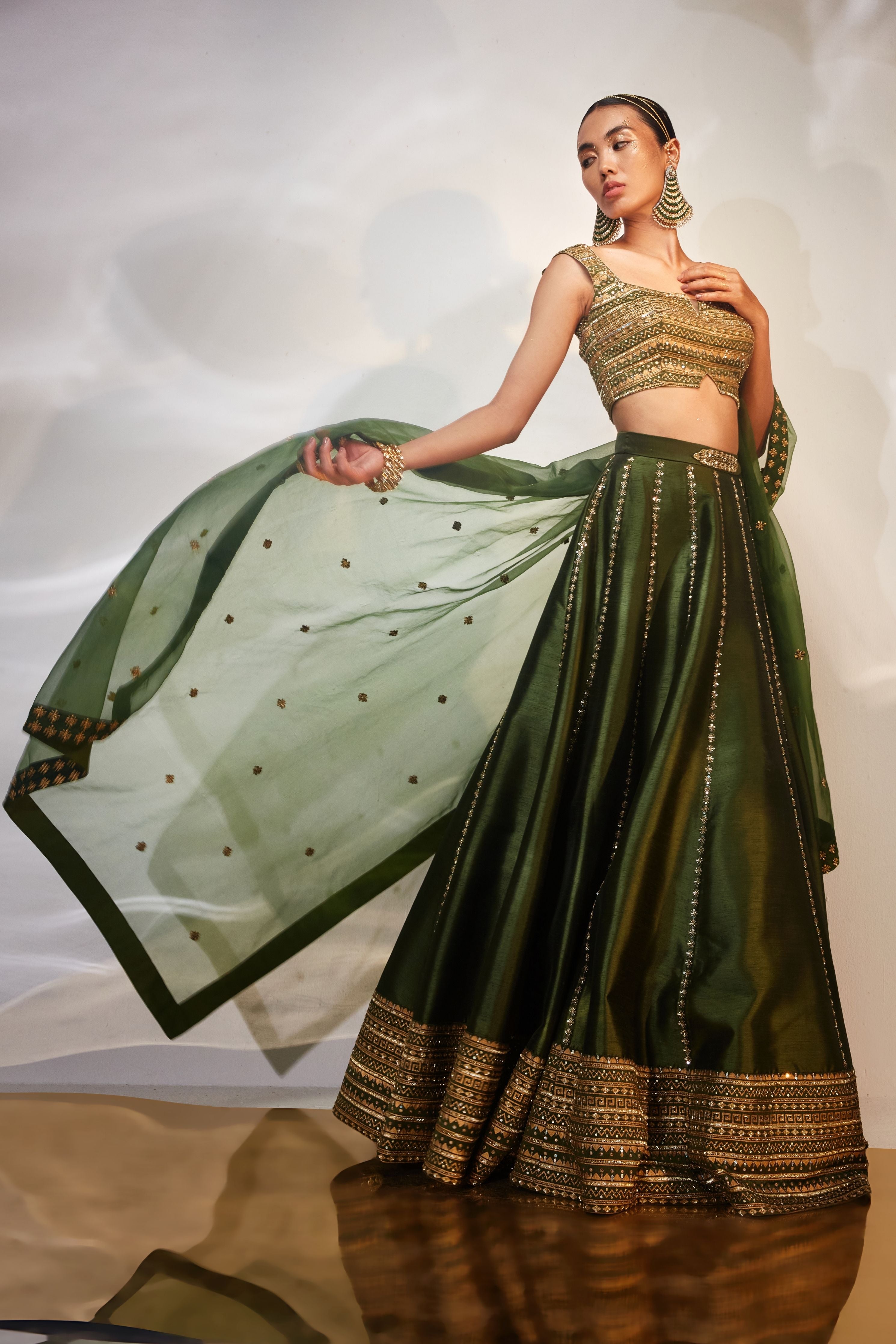 Green lehenga with golden choli deals