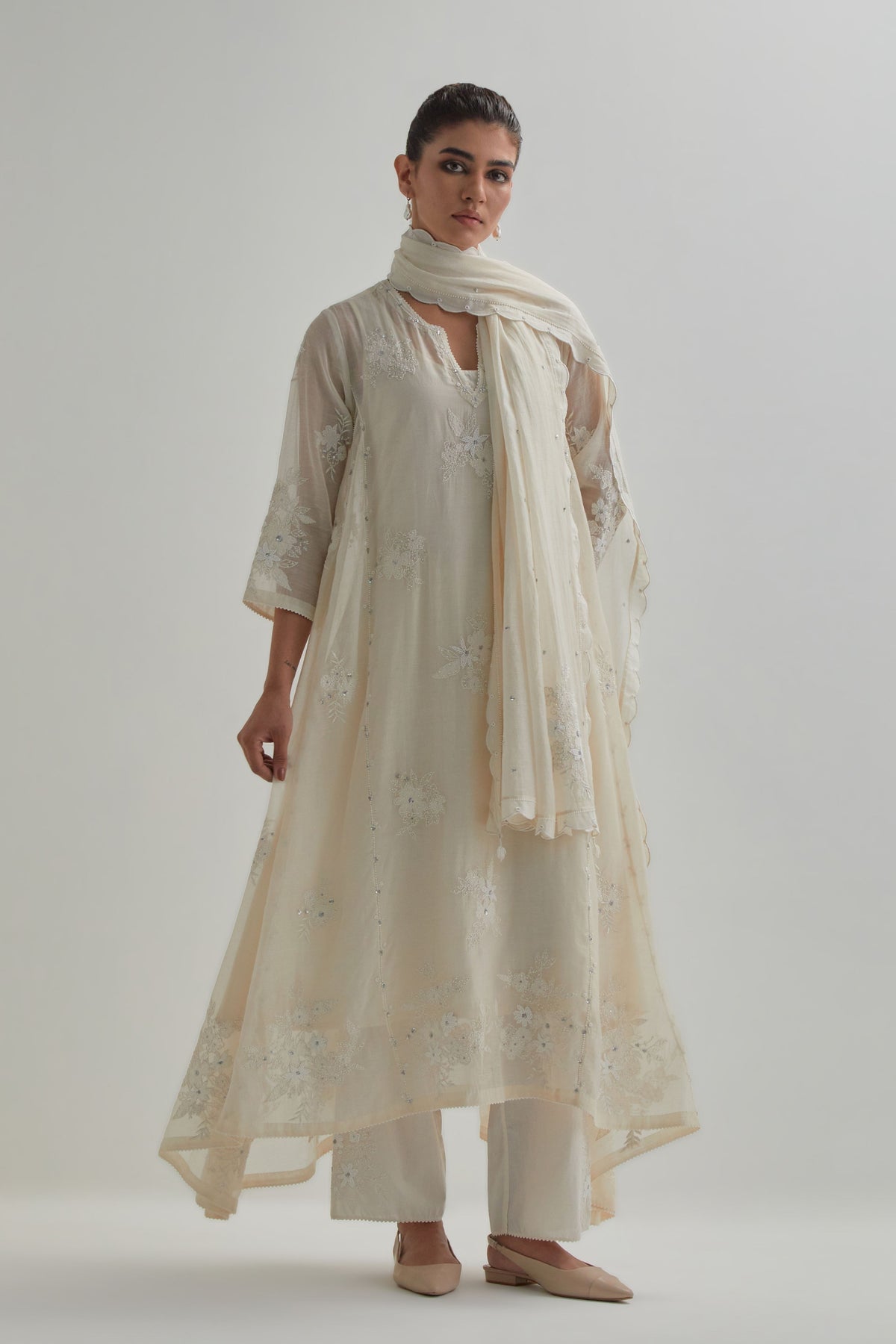 Off White Asymmetric Kurta And Pants