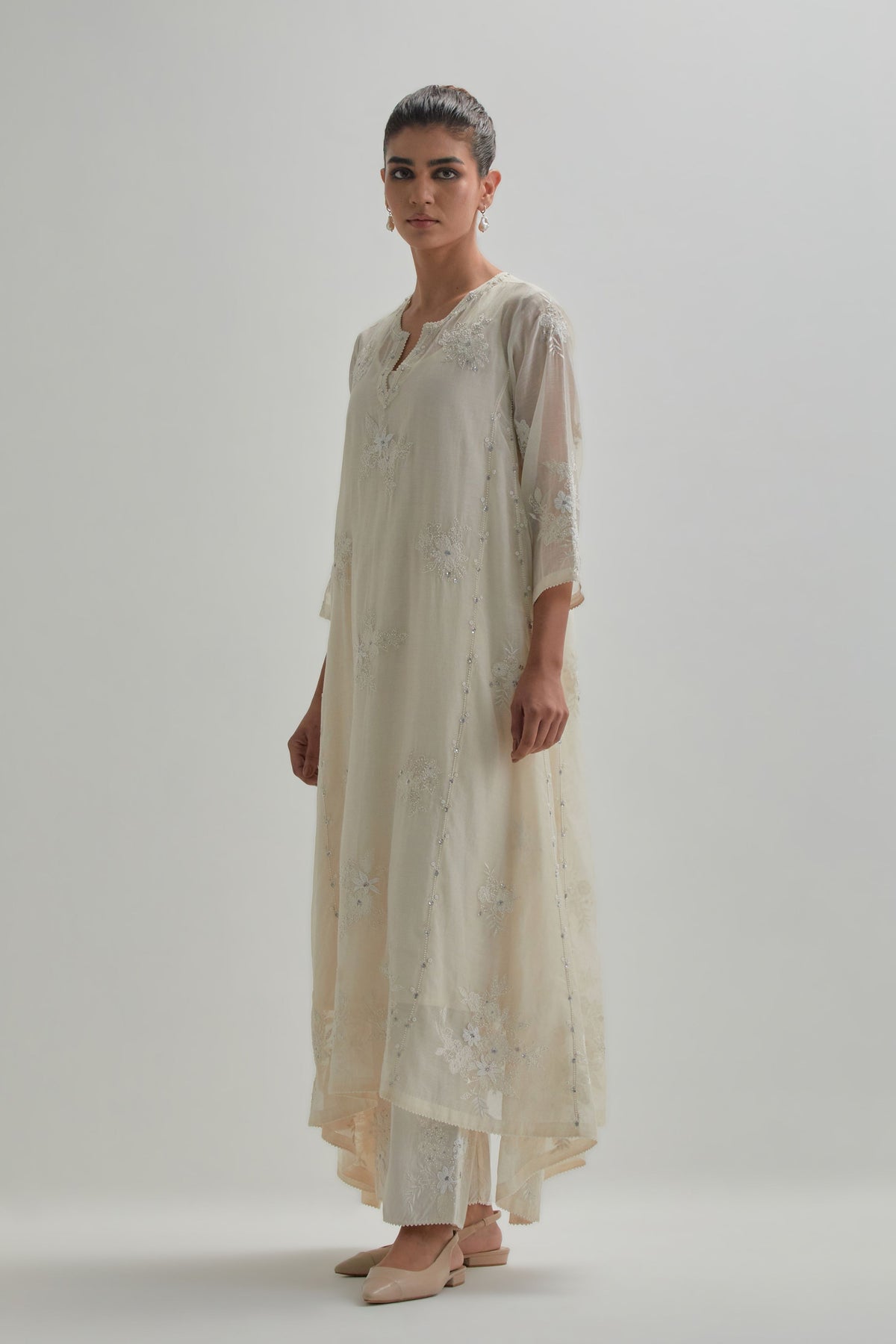 Off White Asymmetric Kurta And Pants