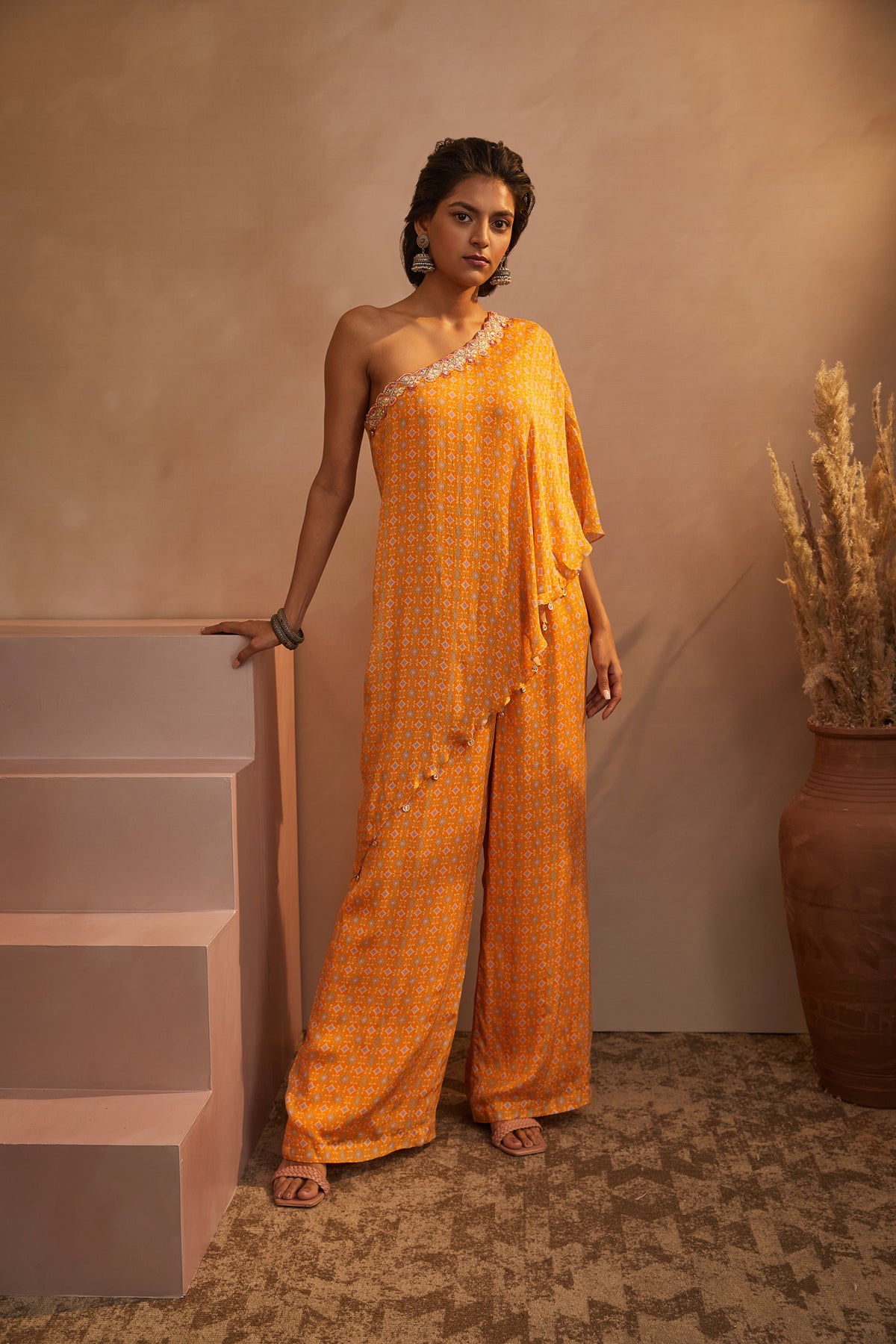 Mustard printed one shoulder jumpsuit