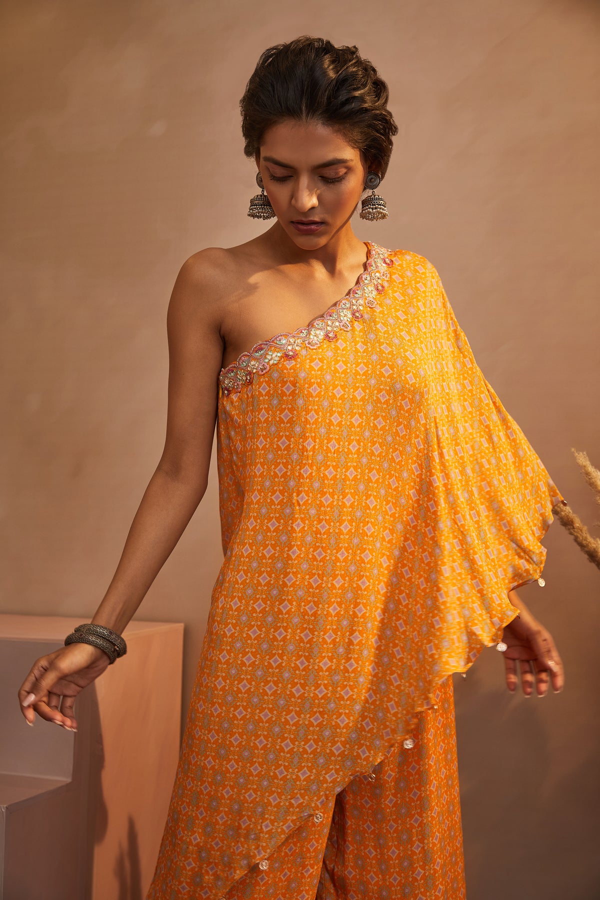 Mustard printed one shoulder jumpsuit