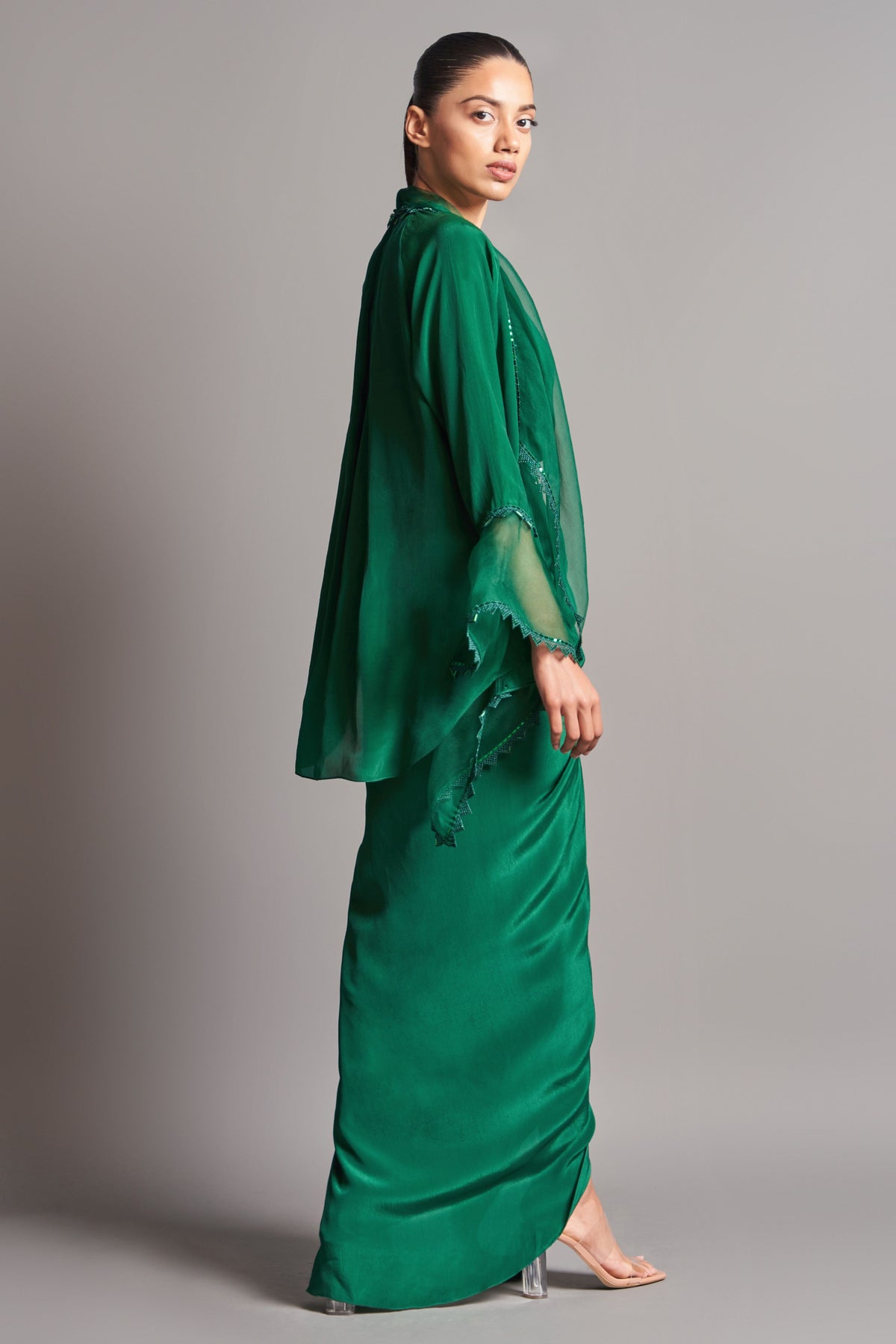 Shawl collar cape with draped skirt