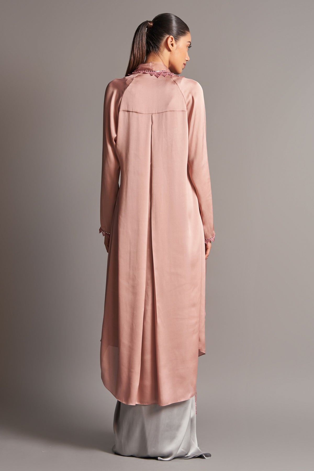 Embroidered blouse with cape and draped skirt