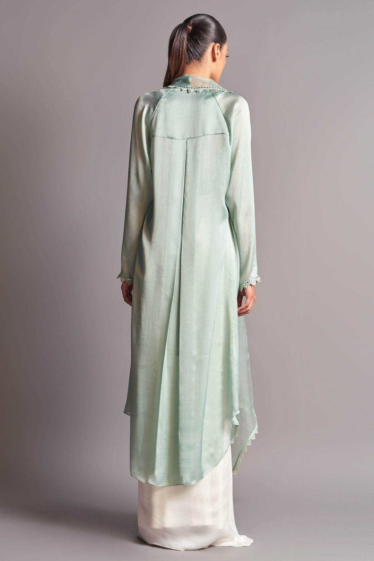 Embroidered blouse with cape and draped skirt