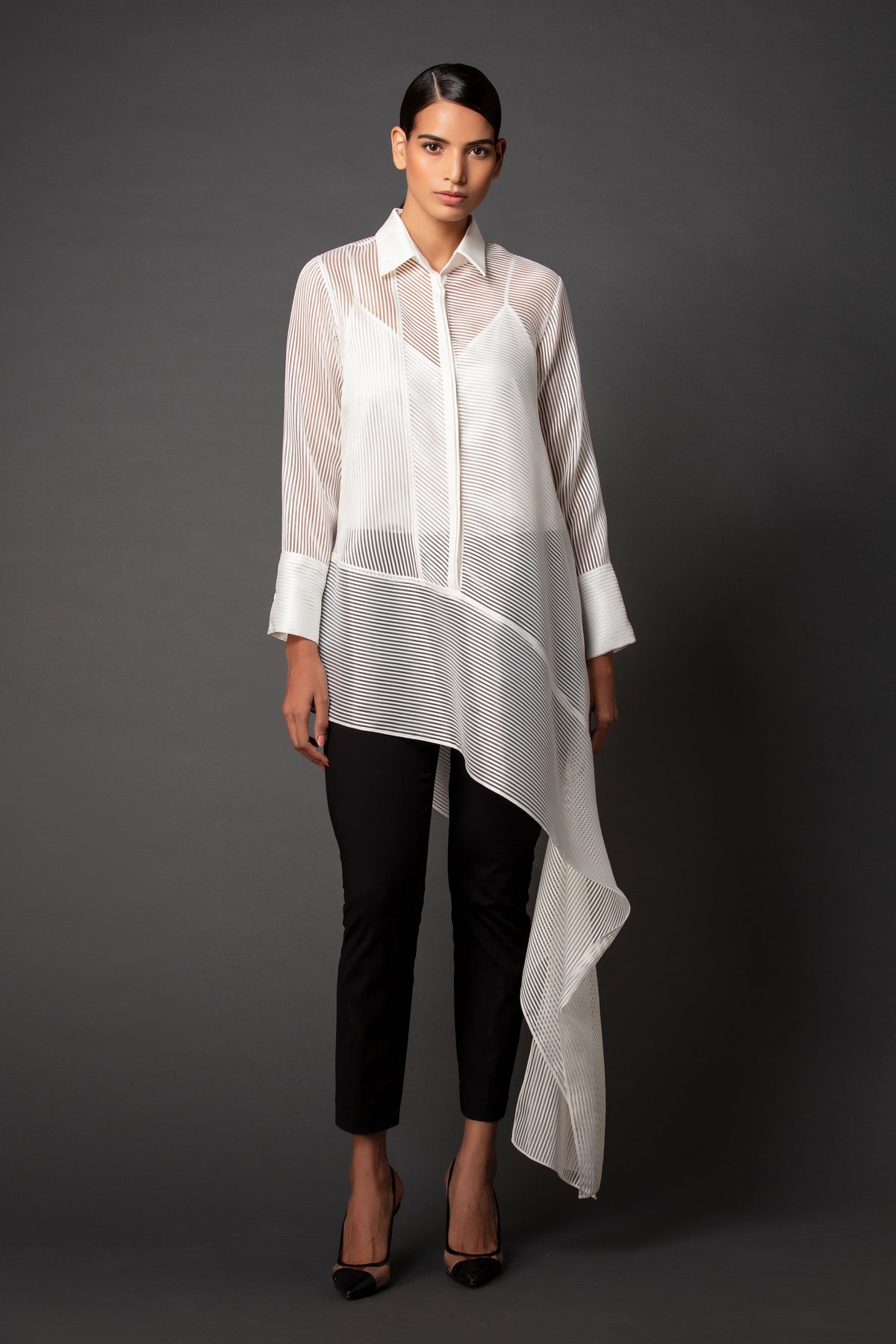 Sheer asymmetric shirt.