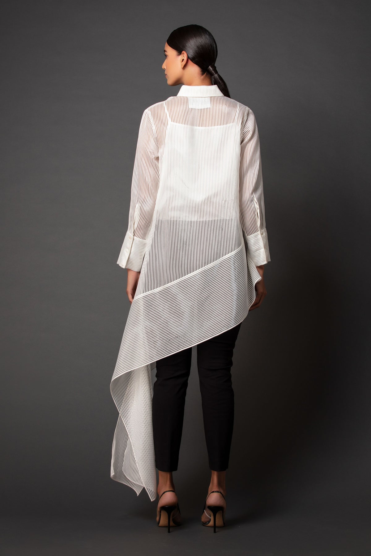 Sheer asymmetric shirt.