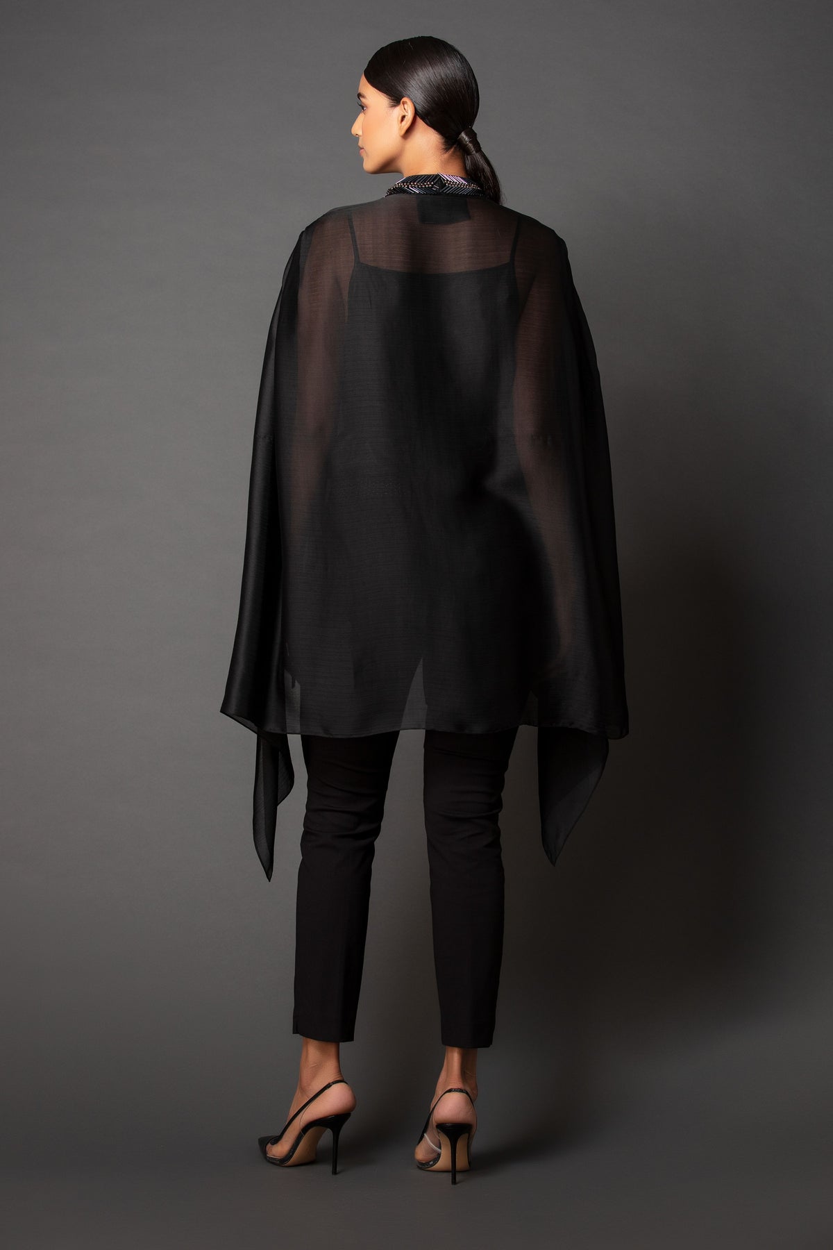 Metallic panelled cape