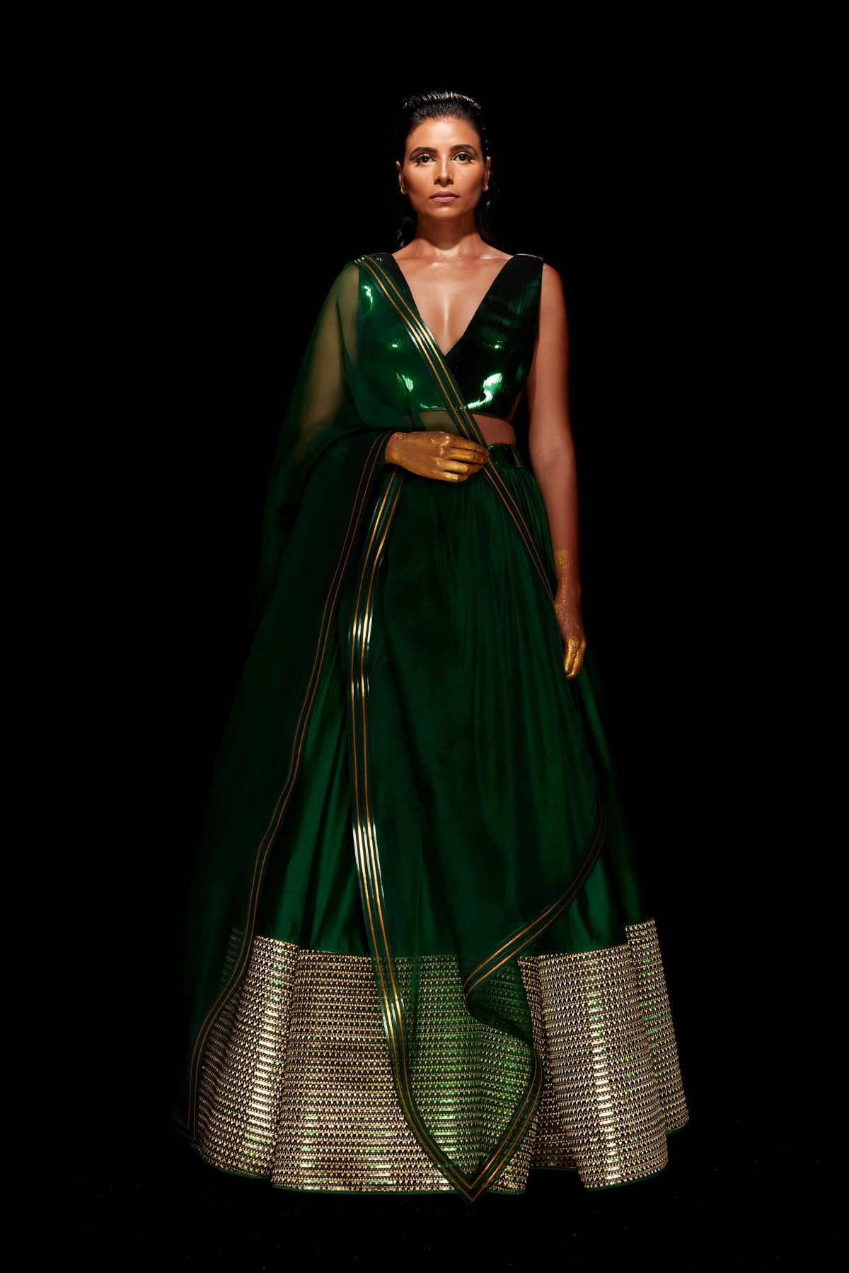 Hand woven metallic lehenga in green