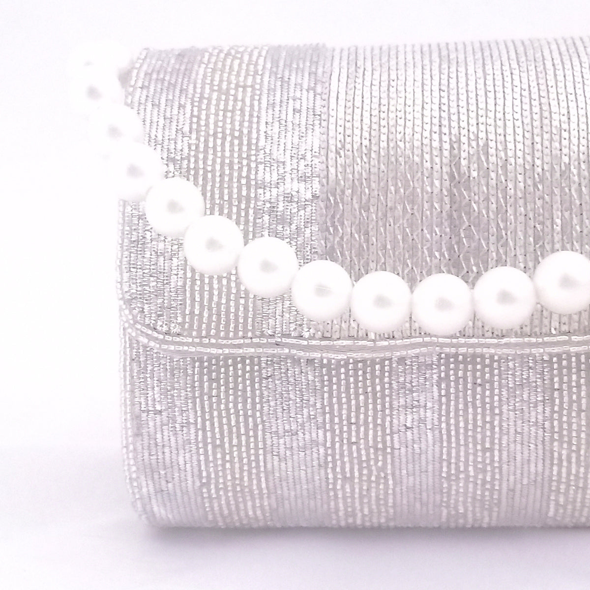 Silver flap over clutch