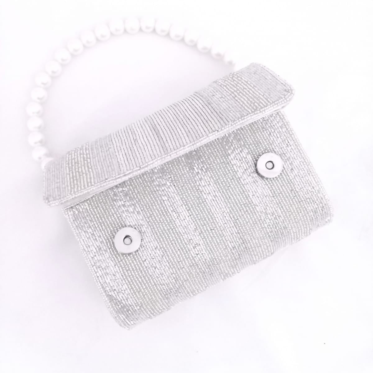 Silver flap over clutch