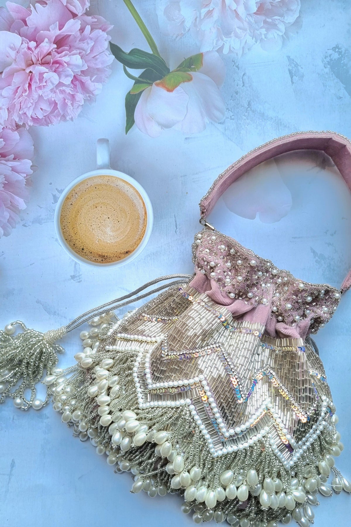Peri pearl tassel handembroidered potli