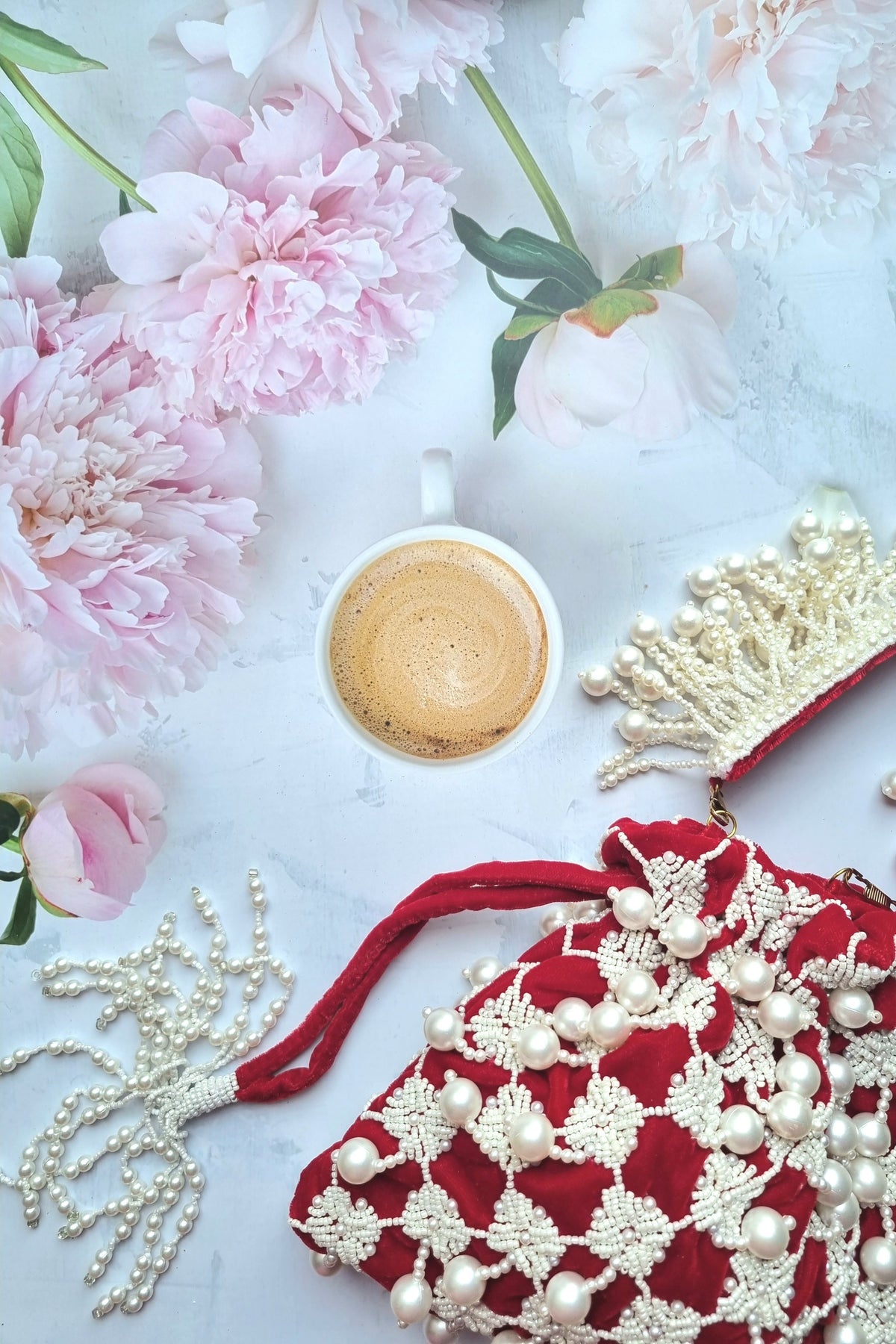 Rubysome pearl tassel handembroidered potli