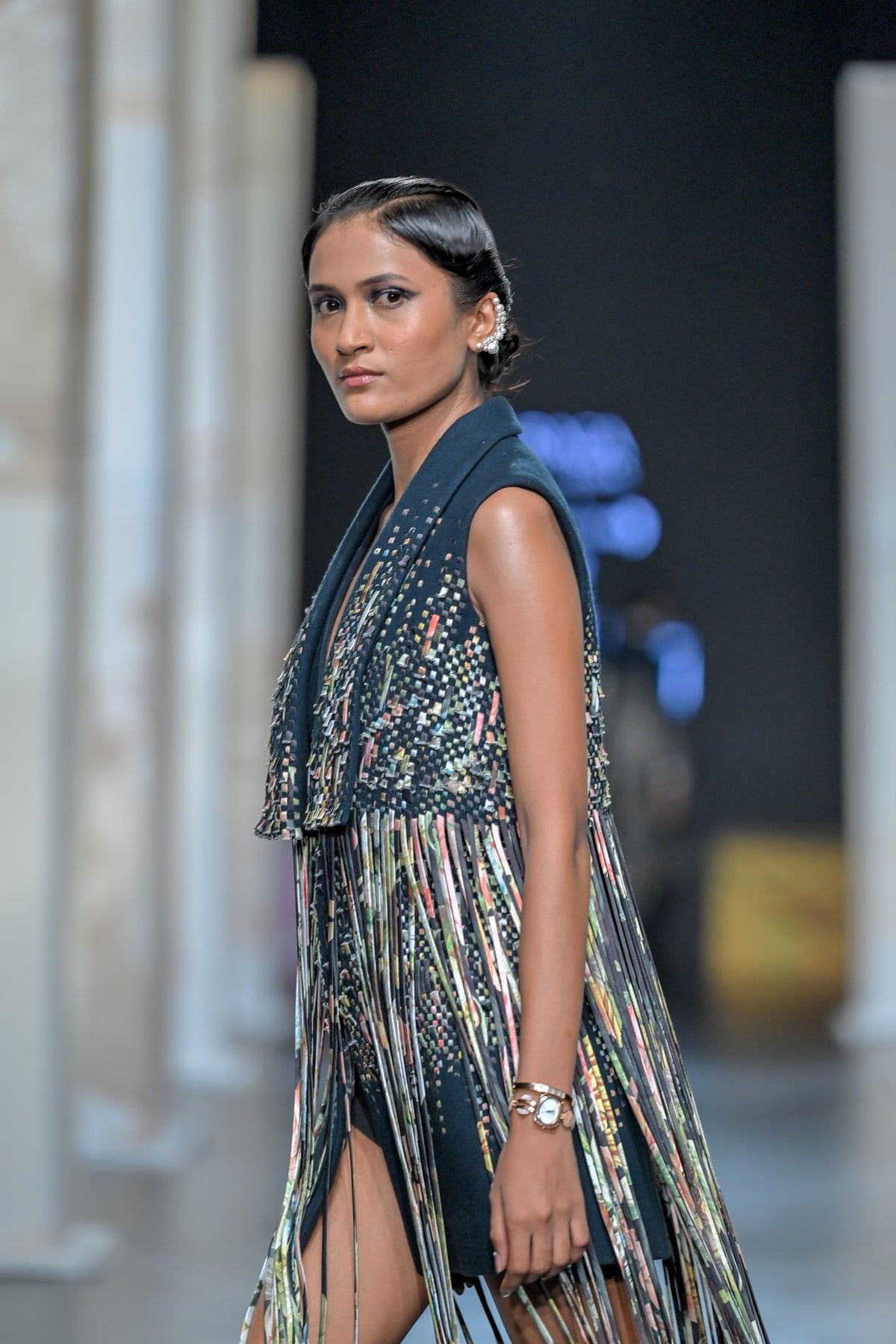The staccato fringe-in motion gilet