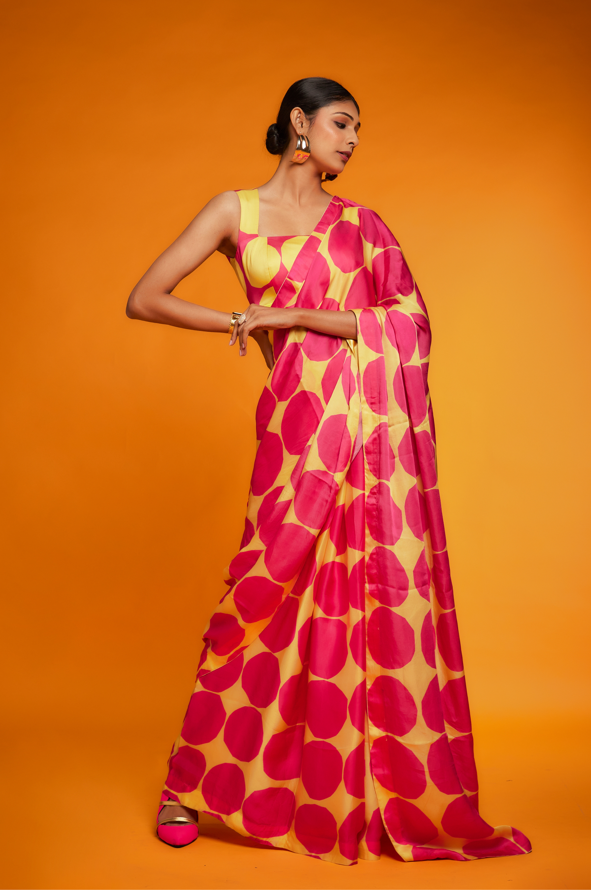 Pink yellow polka printed saree
