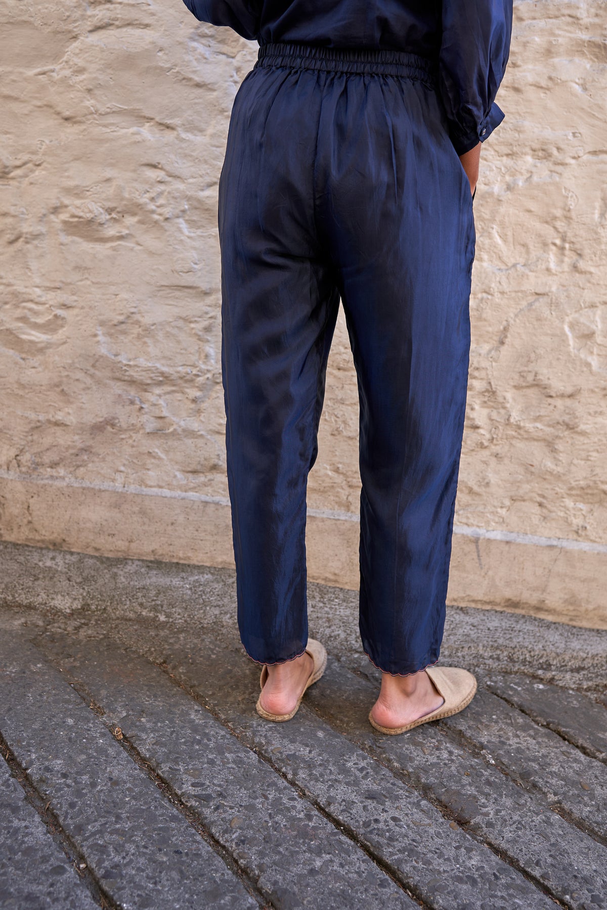 Pull on striper trousers with pockets and scalloped hem