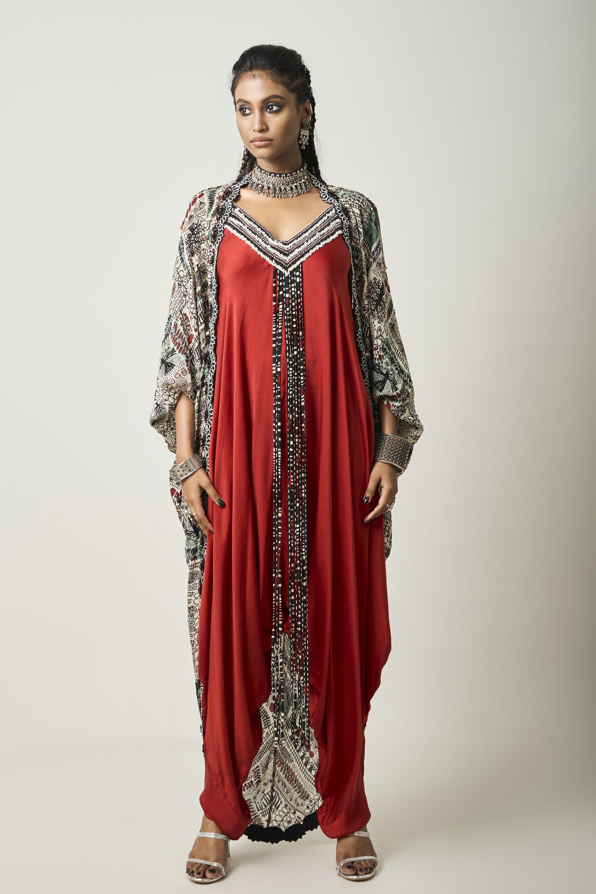 Orange Jumpsuit With Mint Cape