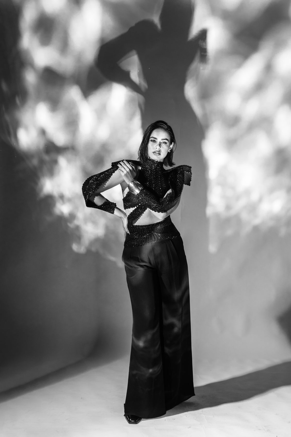 The noire pleated pants