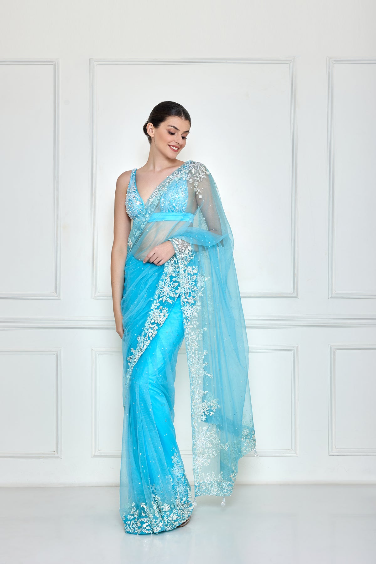 Vivid sky blue net sari